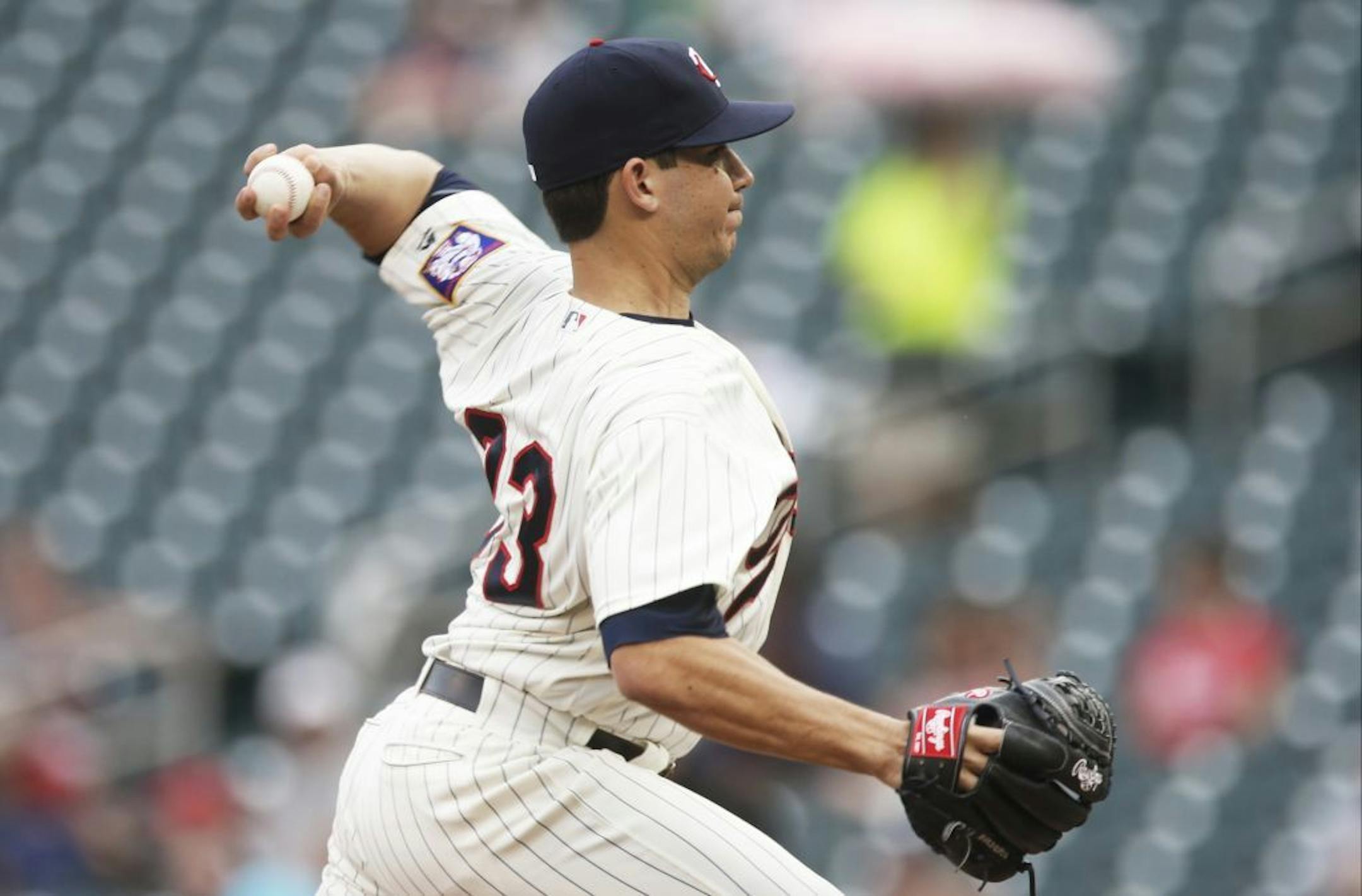 Minnesota Twins pitcher Tommy Milone throws against the Houston Astros in the first inning of the second game of a baseball doubleheader Thursday, Aug. 11, 2016, in Minneapolis.