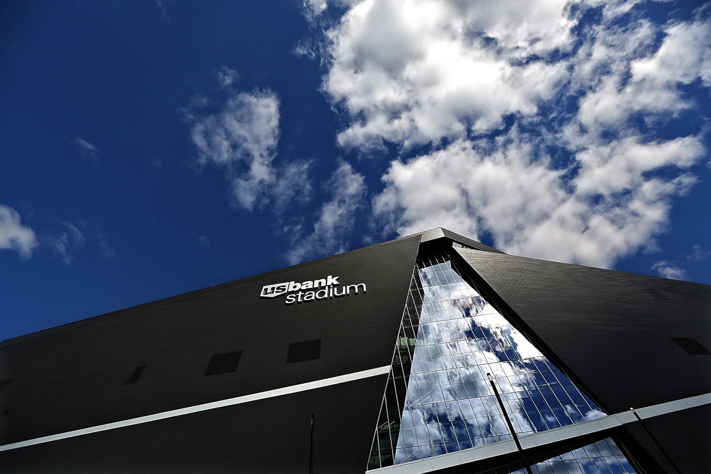 Glass and metal siding outside US Bank Stadium create graphic shapes against the summer sky. ] JIM GEHRZ&#xef;james.gehrz@startribune.com (JIM GEHRZ/STAR TRIBUNE) / June 28, 2016/ 10:00 AM , Minneapolis, MN - BACKGROUND INFORMATION: Pix for special section for the opening of the new US Bank Stadium. You will be shooting photos for the special tab section. LEAVE FROM THE OFFICE AT 9:30 -- YOU'LL BE WALKING OVER WITH JENNI AND MARK V. These are photos that we need shot while you are over there: Gl