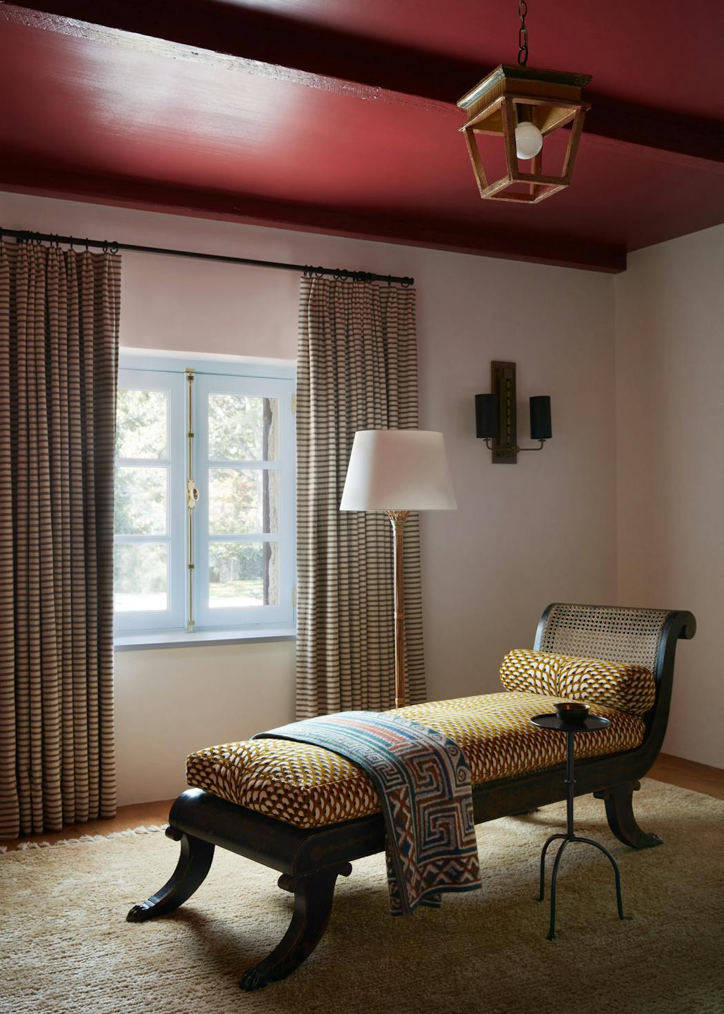 Painting the ceiling a dark hue adds visual depth to a room, while a lighter color can bring a relaxed feel. 