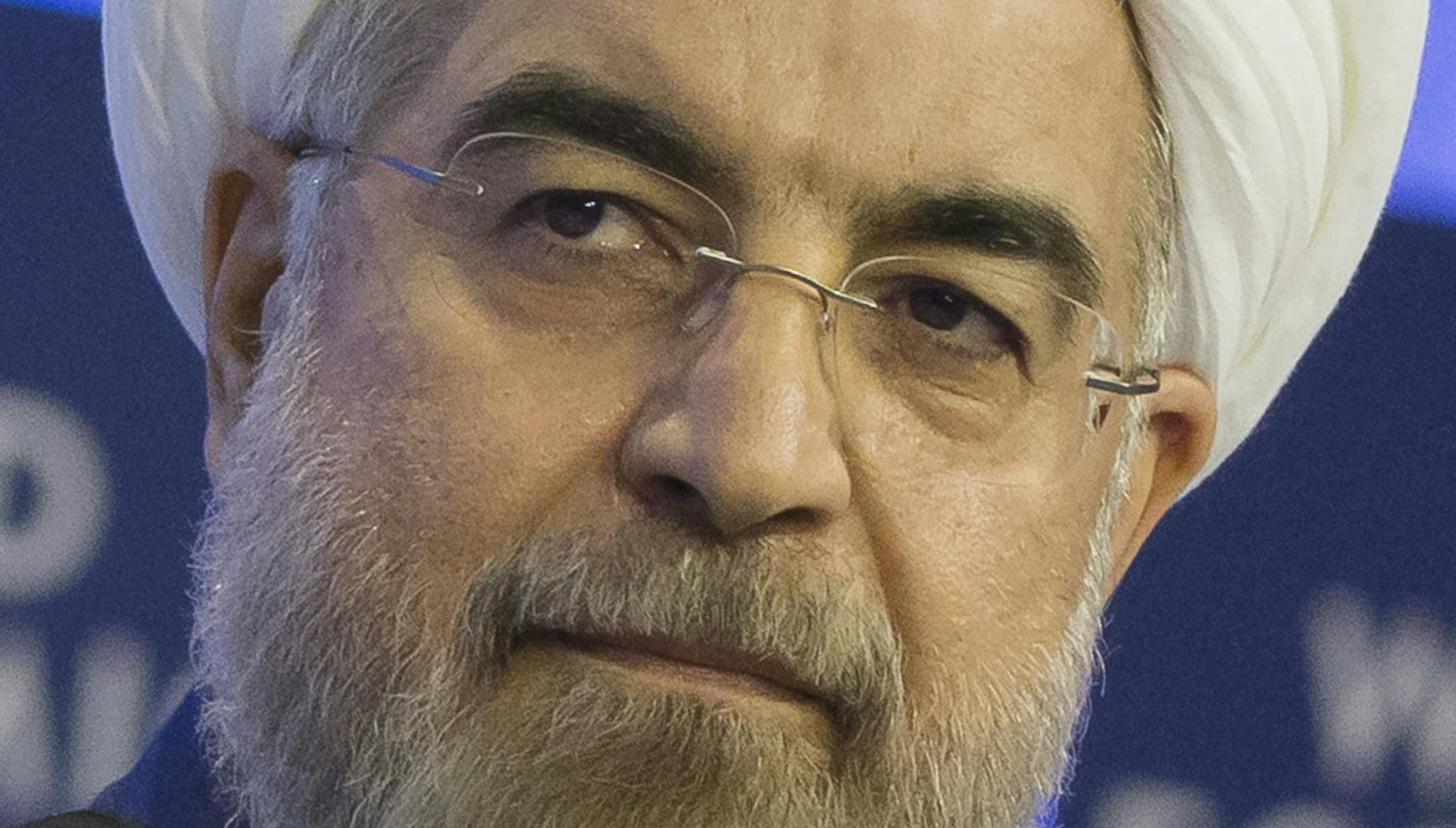 Iranian President Hassan Rouhani listens to welcome remarks during a session of the World Economic Forum in Davos, Switzerland, Thursday, Jan. 23, 2014.