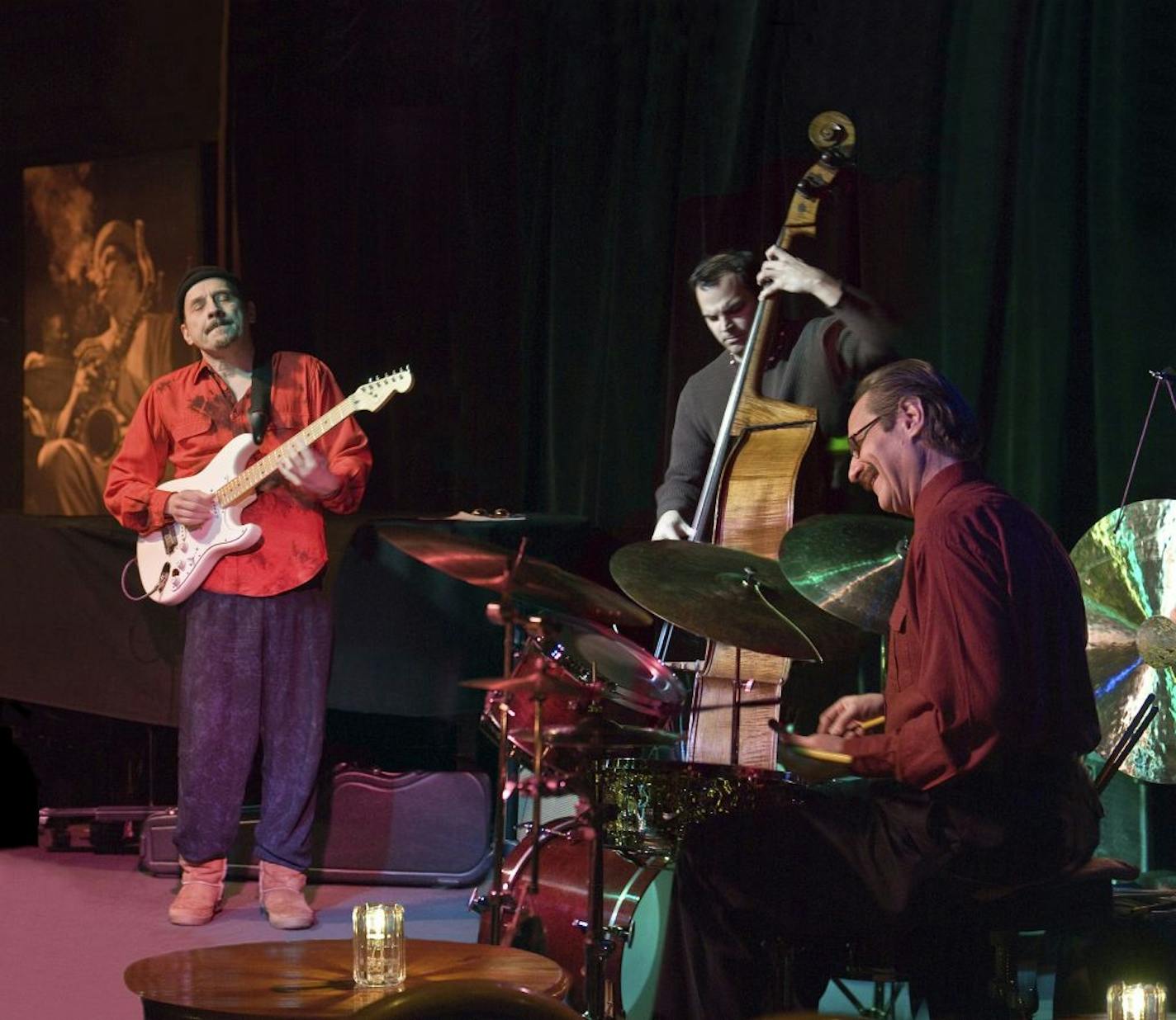 Guitarist Dean Magraw, bassist Chris Bates and drummer Jay Epstein form the jazz-rock trio Red Planet.