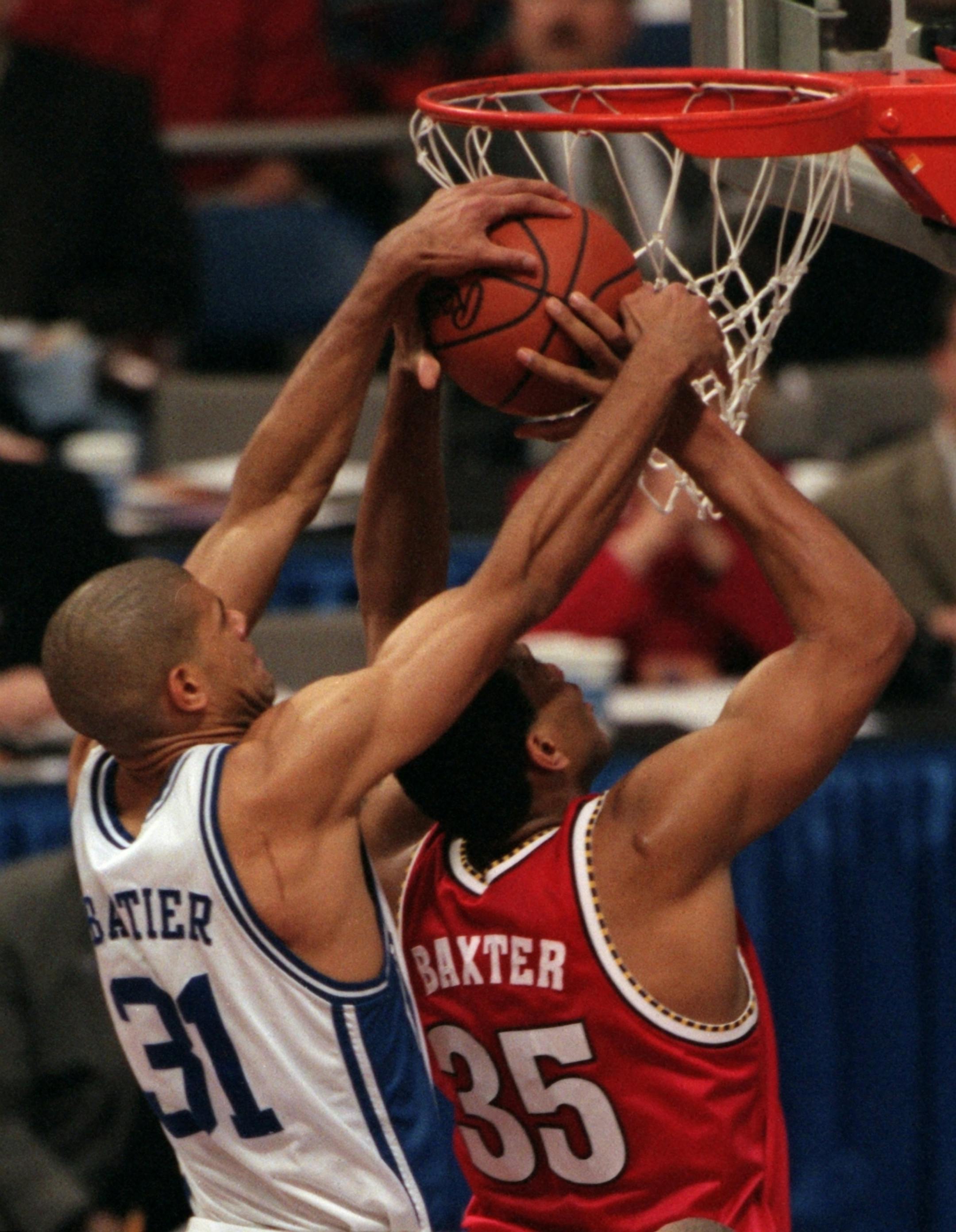 Duke's Carlos Boozer defends against Marylands Lonny Baxter in the 2001 Final Four. (Marlin Levison/Star Tribune)