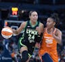 Napheesa Collier of the Lynx drove past Sun forward Alyssa Thomas during the WNBA playoffs this season. 