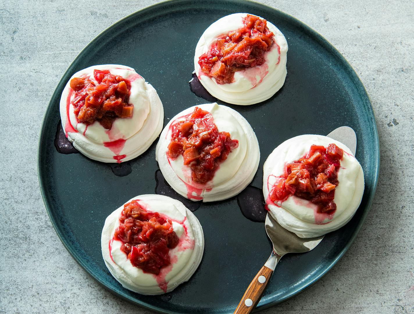 Honey-Orange Rhubarb Compote served over meringues. Recipe by Beth Dooley, photo by Mette Nielsen, Special to the Star Tribune