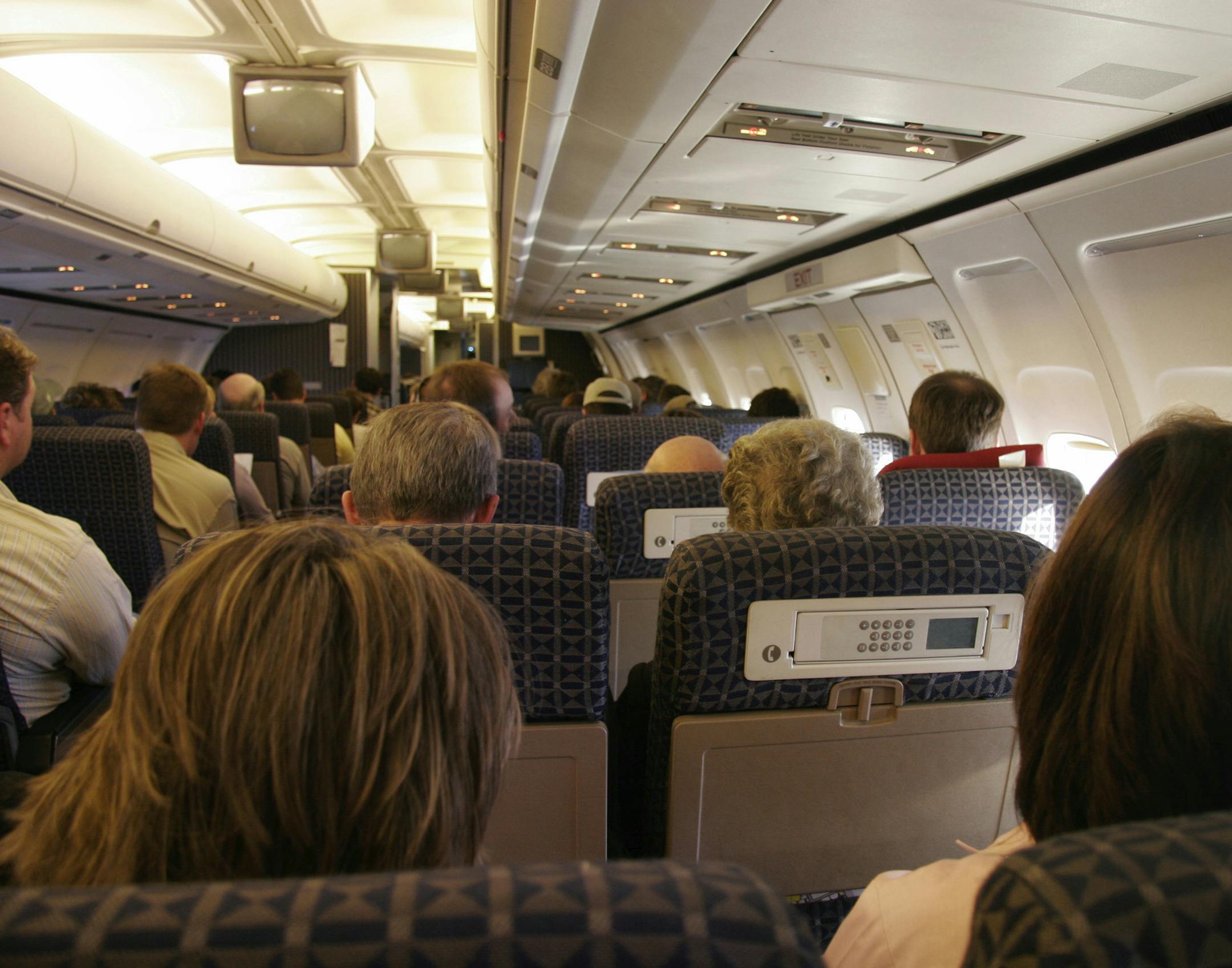 credit: iStock Passengers have lots of company on this crowded airplane.