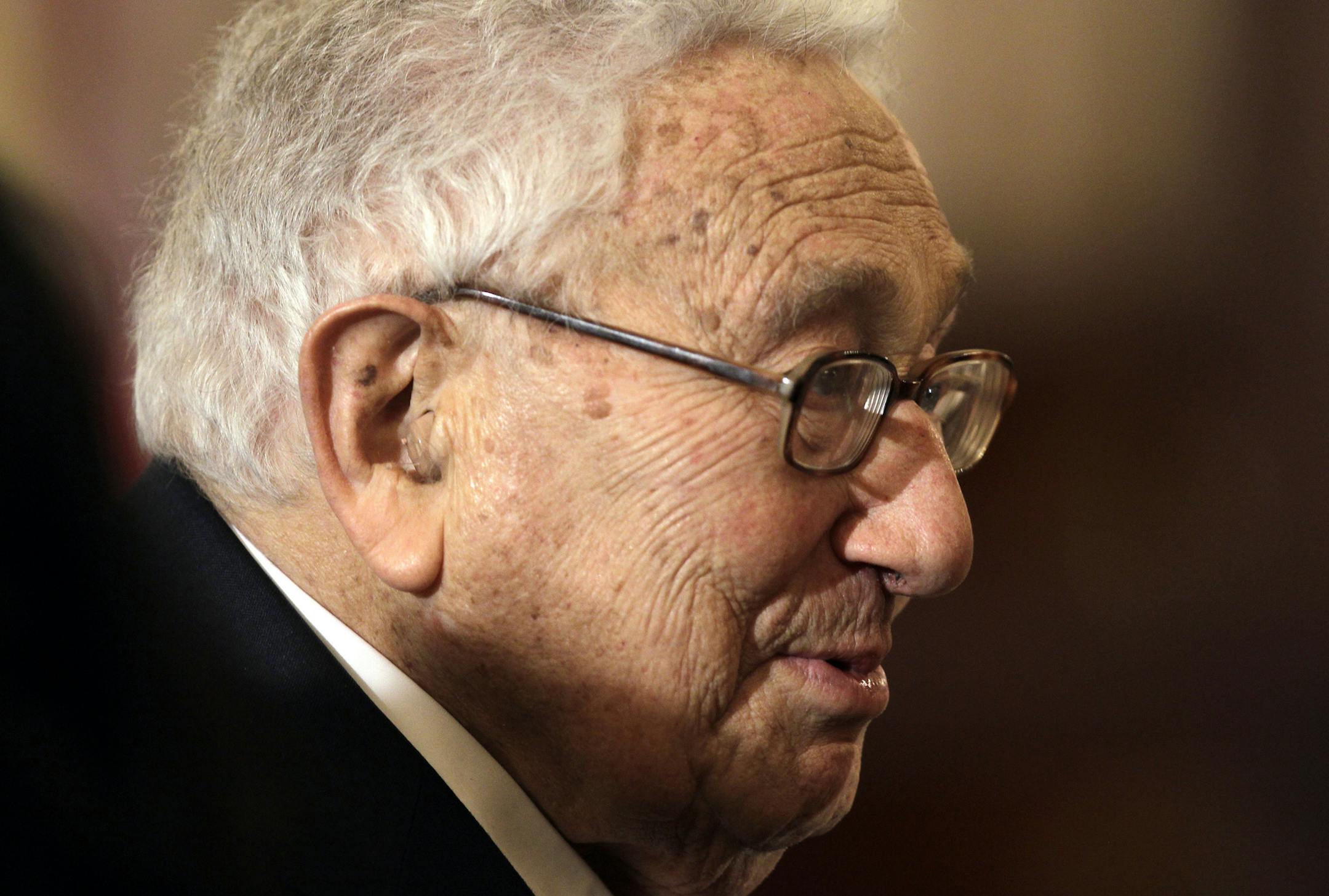 Former Secretary of State Henry Kissinger attends a luncheon for Japanese Prime Minister Shinzo Abe at the State Department in Washington, Tuesday, April 28, 2015.(AP Photo/Luis M. Alvarez) ORG XMIT: DCLA115
