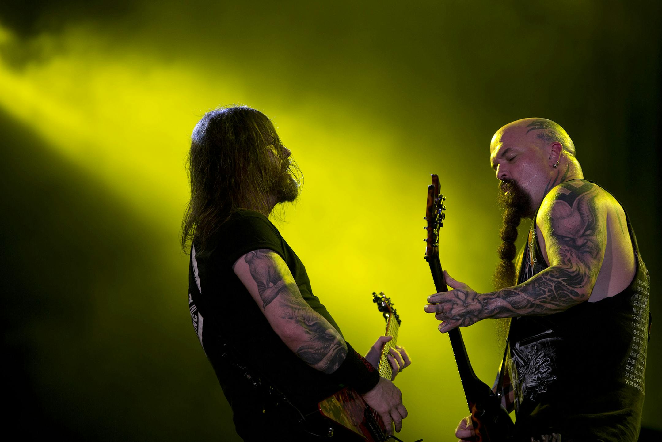 Kerry King, right, and Gary Holt of the American trash metal band Slayer performs during the Rock in Rio music festival in Rio de Janeiro, Brazil, Sunday, Sept. 22, 2013. More than 80 thousand people a day were expected to attend the week-long festival which features over 120 bands and artists and runs until Sunday. Conceived by the entrepreneur Roberto Medina, the first Rock in Rio took place in the Rio de Janeiro in 1985. (AP Photo/Felipe Dana)