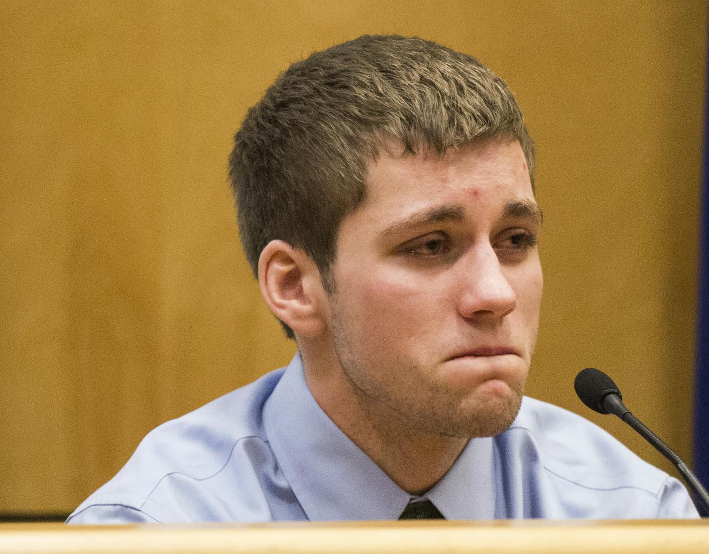 Levi Acre-Kendall breaks down while testifying during his trial in Polk County Circuit Court in Balsam Lake on Friday, December 11, 2015.