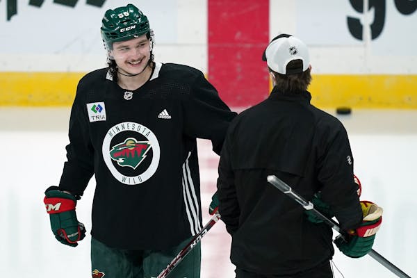 No. 59 with a mullet: Rookie Addison brings big hair to Wild blueline