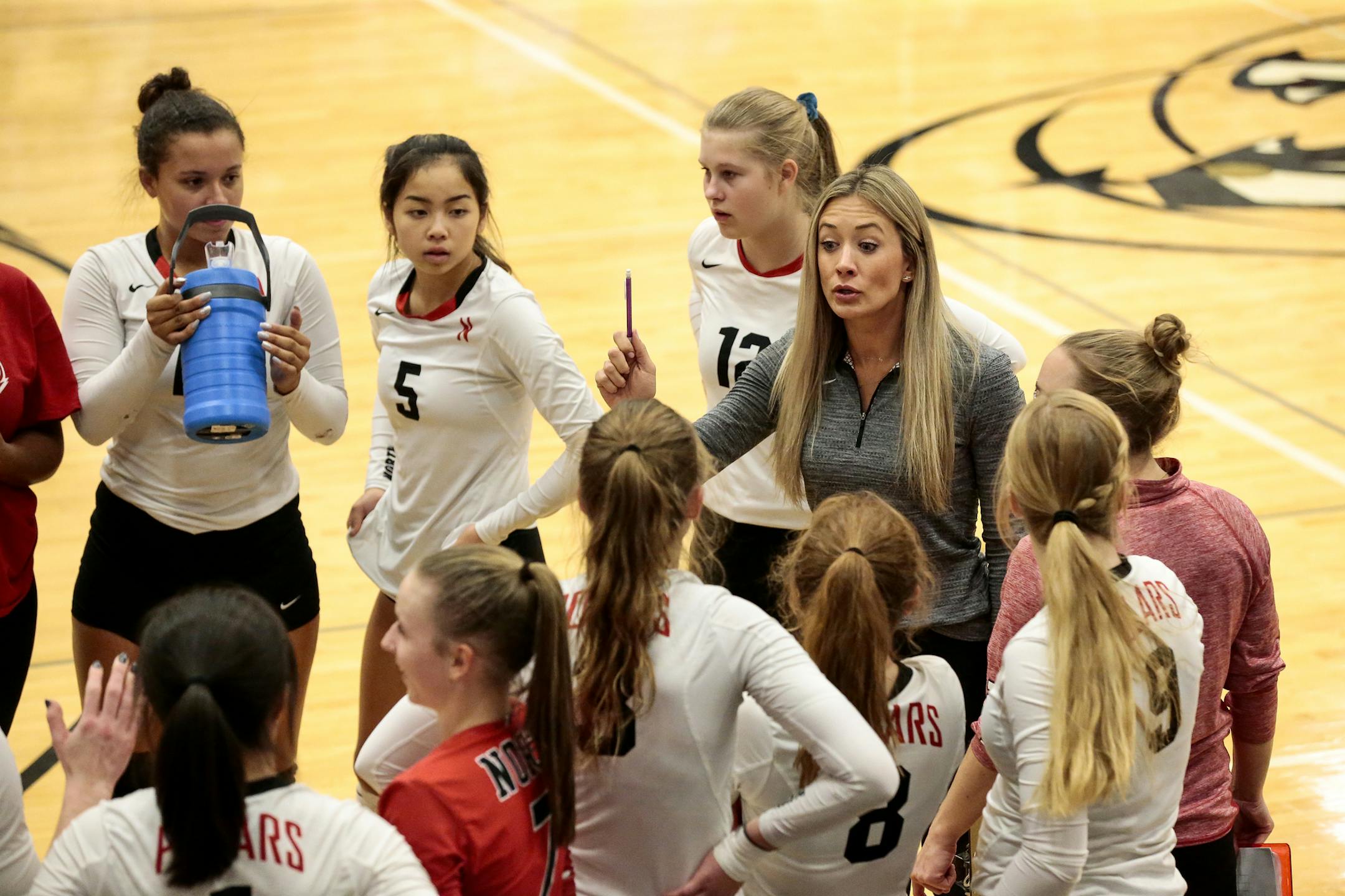 North St. Paul coach Stephanie Blanda instructs her players during their section final victory over Stillwater. Don't be surprised if you see Blanda and her team dancing at the state tournament. Photo: Cheryl A. Myers, SportsEngine