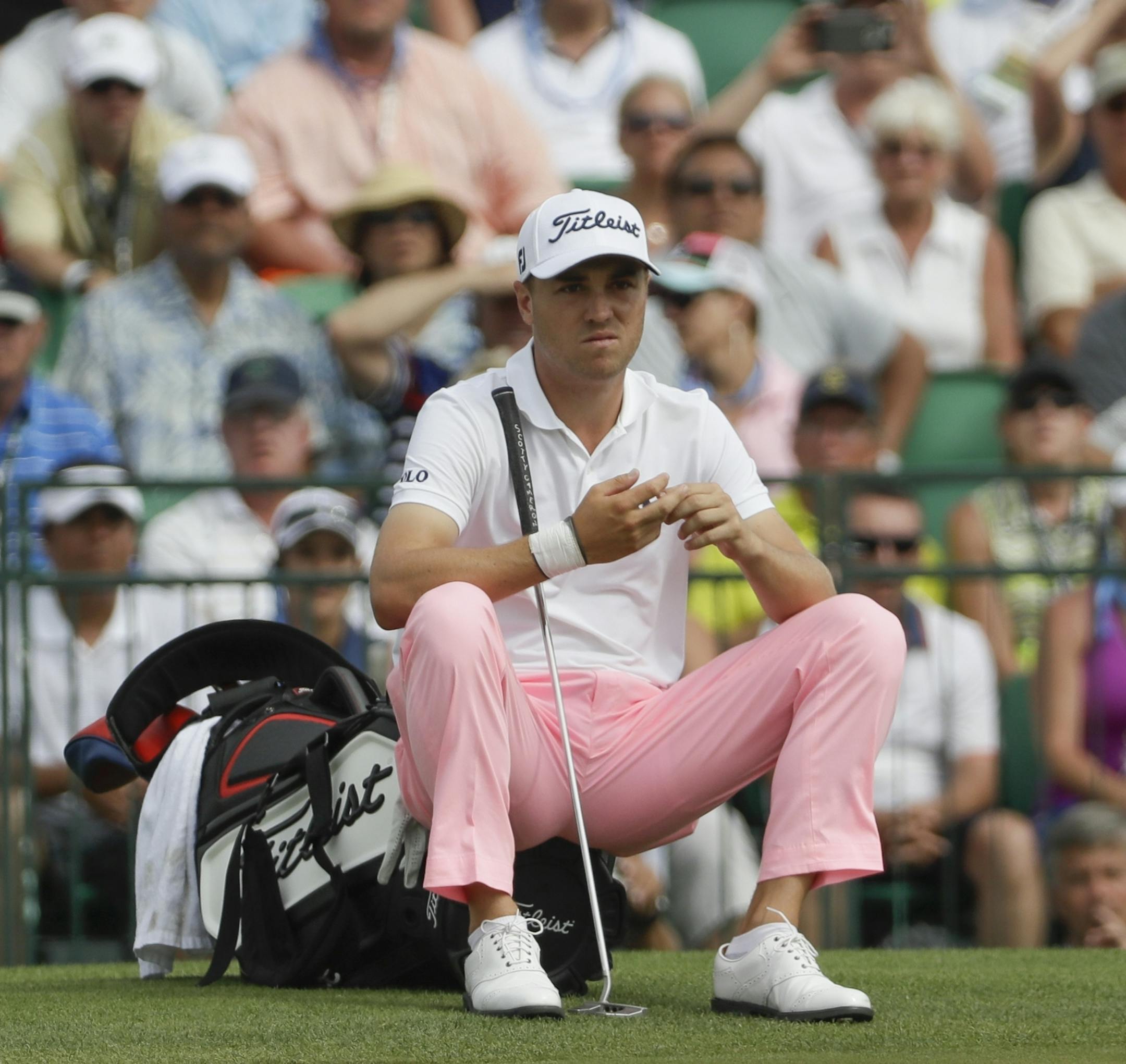 Justin Thomas waits to putt on the 18th hole during the third round of the U.S. Open golf tournament Saturday, June 17, 2017, at Erin Hills in Erin, Wis. (AP Photo/David J. Phillip)
