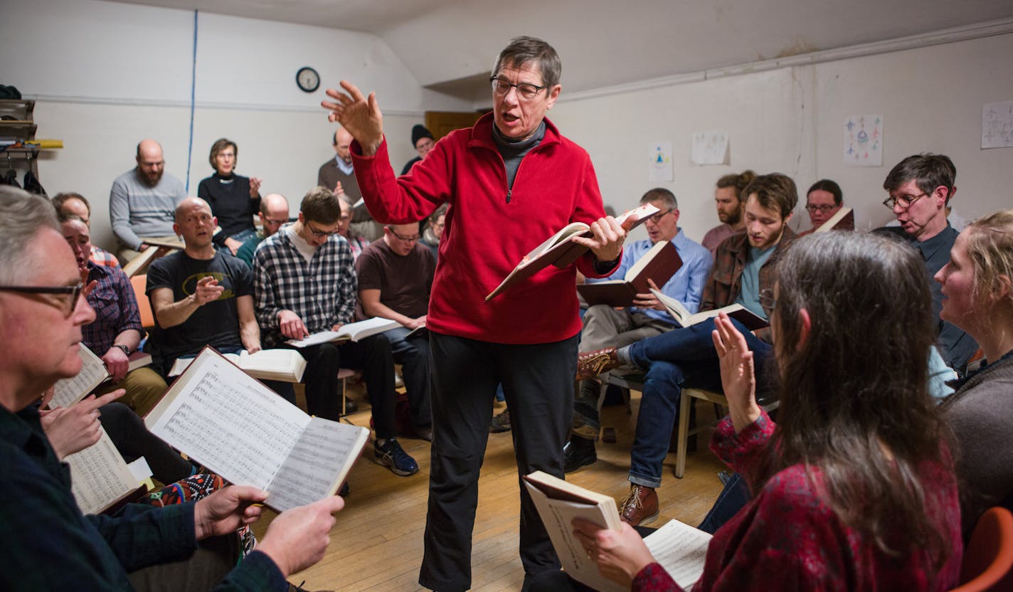 Claudia Egelhoff of Minneapolis leads the congregation in song. Egelhoff said she has been been singing shape-note for 35 years after discovering it while living in North Carolina. ] Mark Vancleave - mark.vancleave@startribune.com * Shape-note singers congregated at the University Baptist Church in Minneapolis on Tuesday, Feb. 17, 2015. The informal group meets weekly to sing from The Sacred Harp songbook.