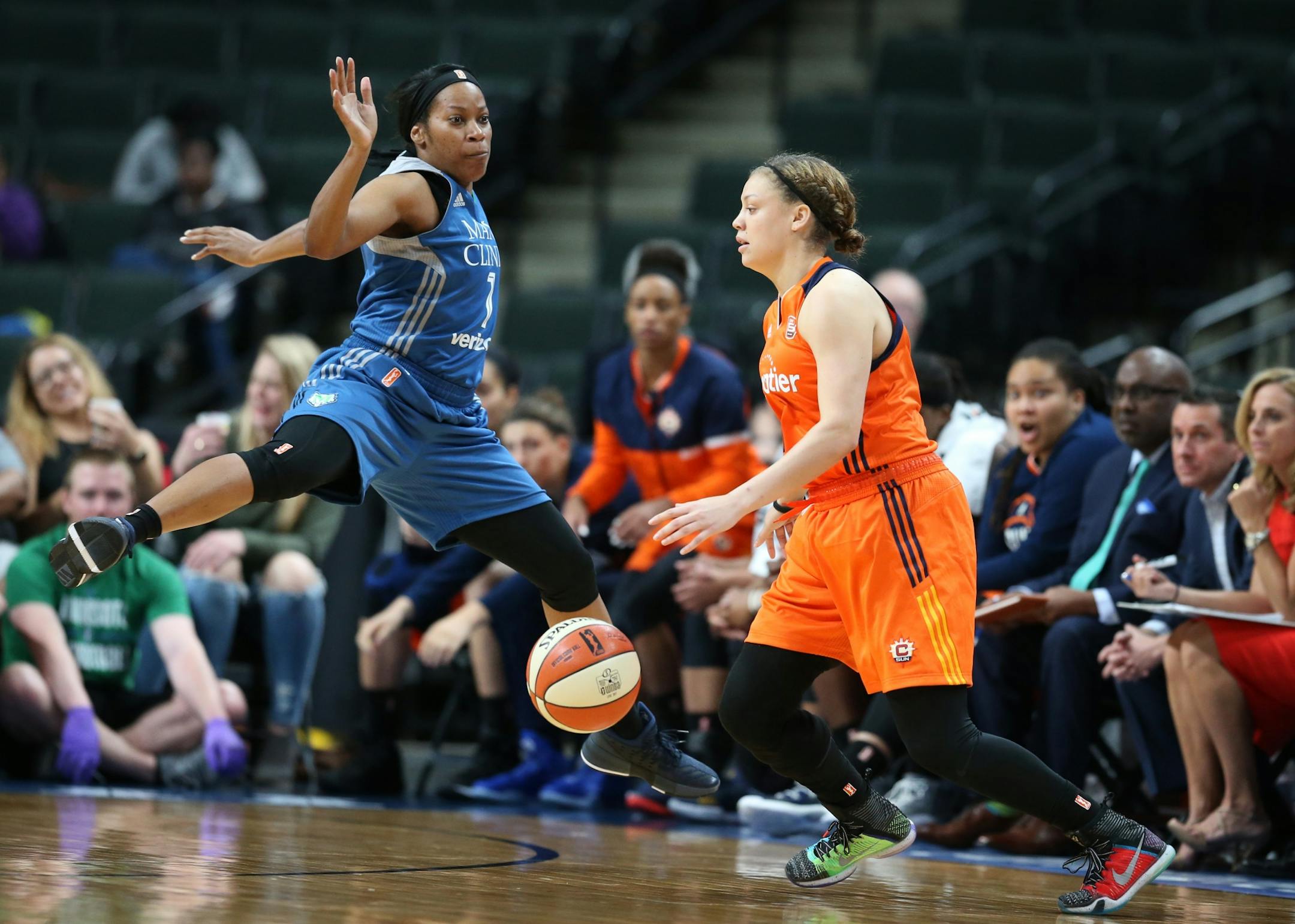 Connecticut Sun guard Rachel Banham (1) dribbled passed Minnesota Lynx guard Jia Perkins (7) in the second half at Xcel Energy Center May 22, 2017 in St. Paul, MN.