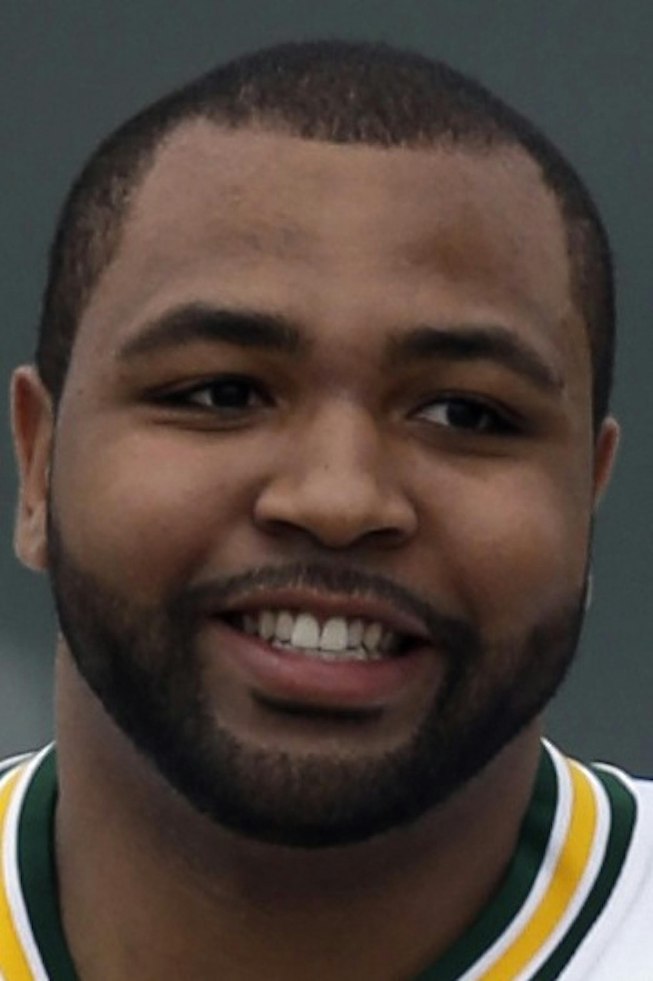 Green Bay Packers' Derek Sherrod rides a bike to NFL football training camp Friday, July 26, 2013, in Green Bay, Wis. (AP Photo/Morry Gash) ORG XMIT: WIMG1