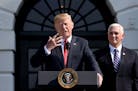 U.S. President Donald Trump comments on the 4.1 percent economic growth for the second quarter as Vice President Mike Pence looks on during a statemen