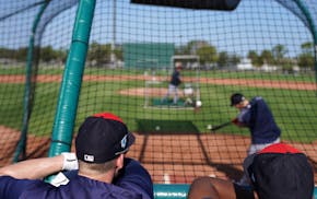 Players and coaches watched as catchers took batting practice Saturday. ] ANTHONY SOUFFLE &#x2022; anthony.souffle@startribune.com Minnesota Twins pla