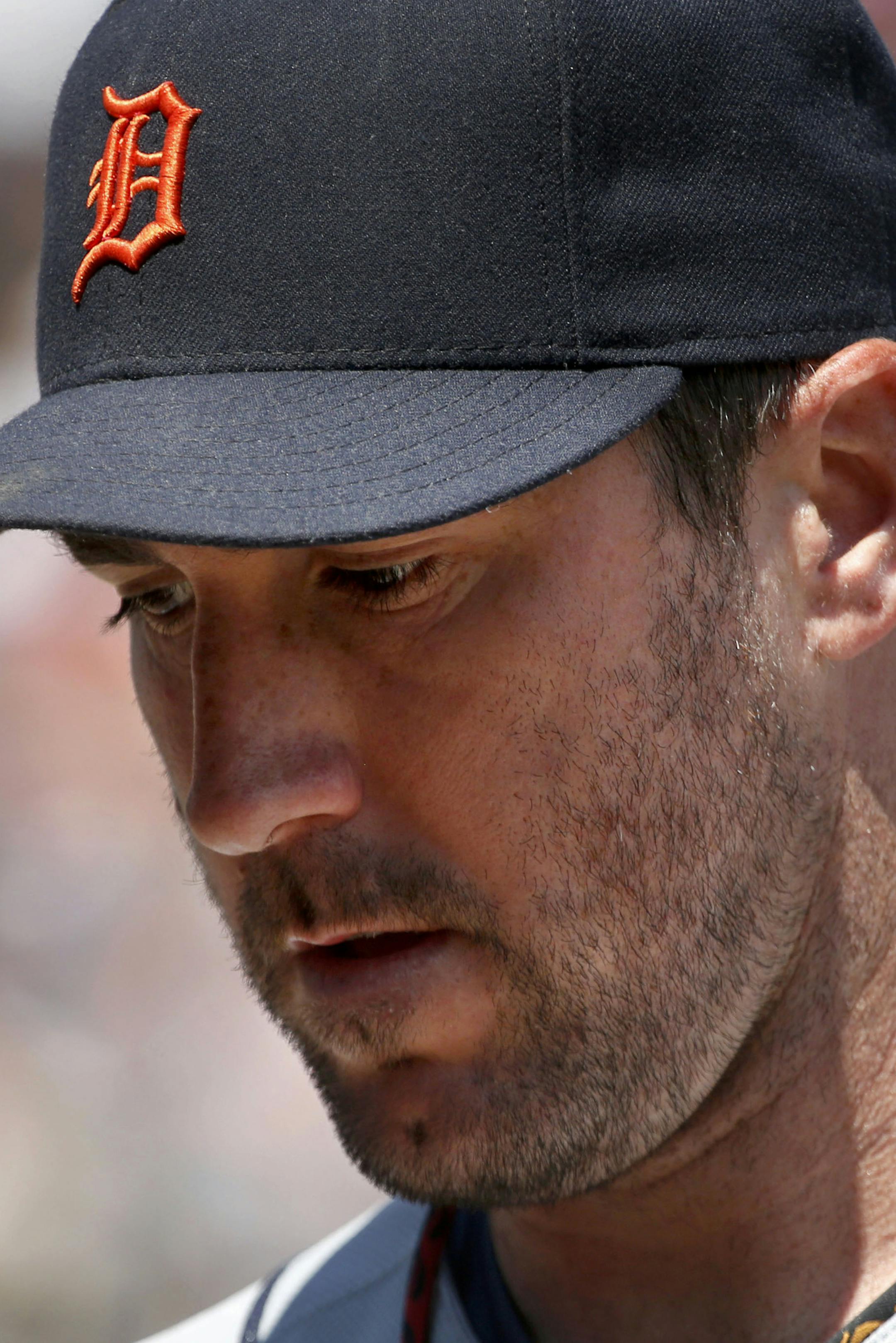 Detroit Tigers starting pitcher Justin Verlander heads into the dugout after giving up four runs to the Chicago White Sox in the fourth inning of a baseball game Thursday, July 25, 2013, in Chicago. (AP Photo/Charles Rex Arbogast) ORG XMIT: MIN2013072619371875