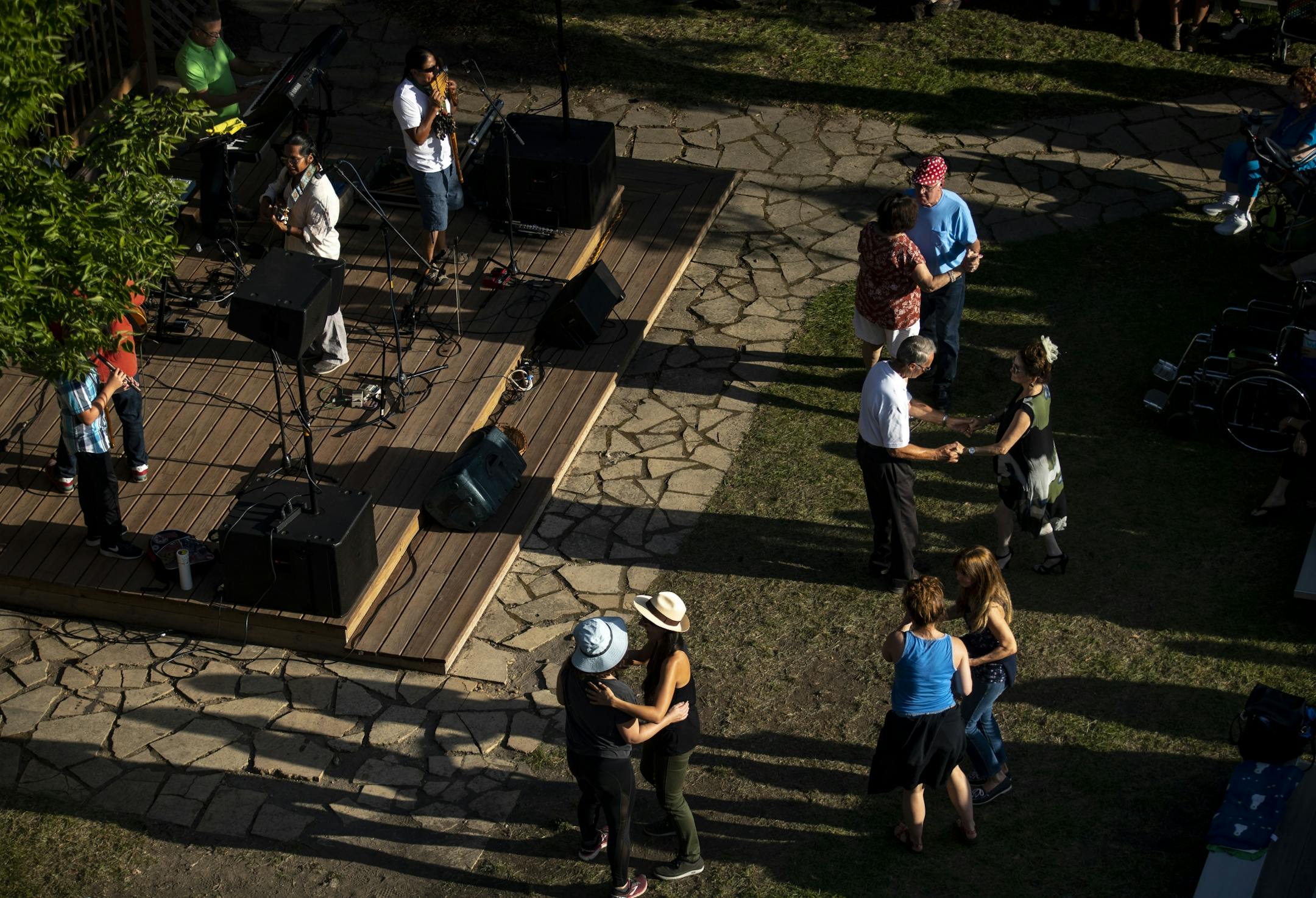 (From Left) Ecuador Manta travels each year to Minnesota to perform at the state fair. On Friday August 23, 2019, they performed outside the DNR Building and dozens of people got up to dance to songs that spoke to them.