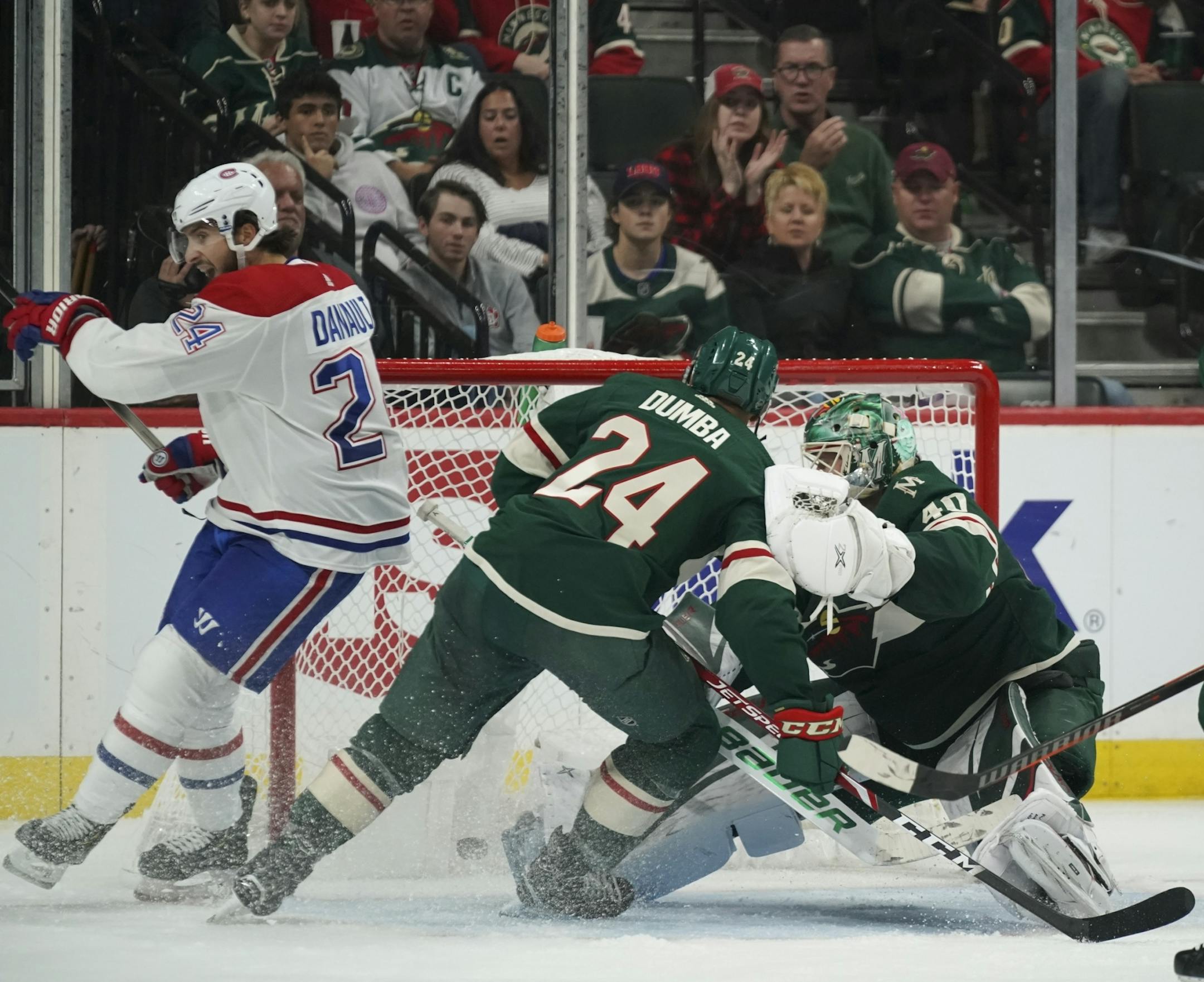 Montreal Canadiens left wing Phillip Danault (24) began to celebrate after scoring a go ahead goal in the third period on Minnesota Wild goaltender Devan Dubnyk (40) with Matt Dumba (24) defending.