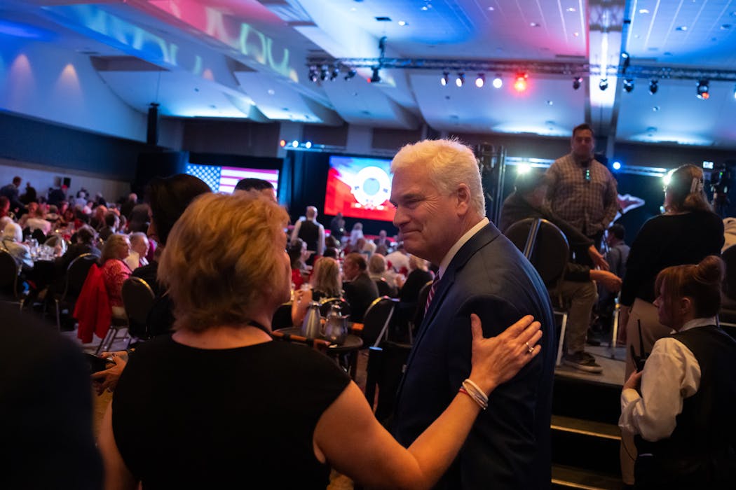 U.S. Rep. Tom Emmer greets attendees at the state Republican Party's annual Lincoln Reagan dinner on Friday. 