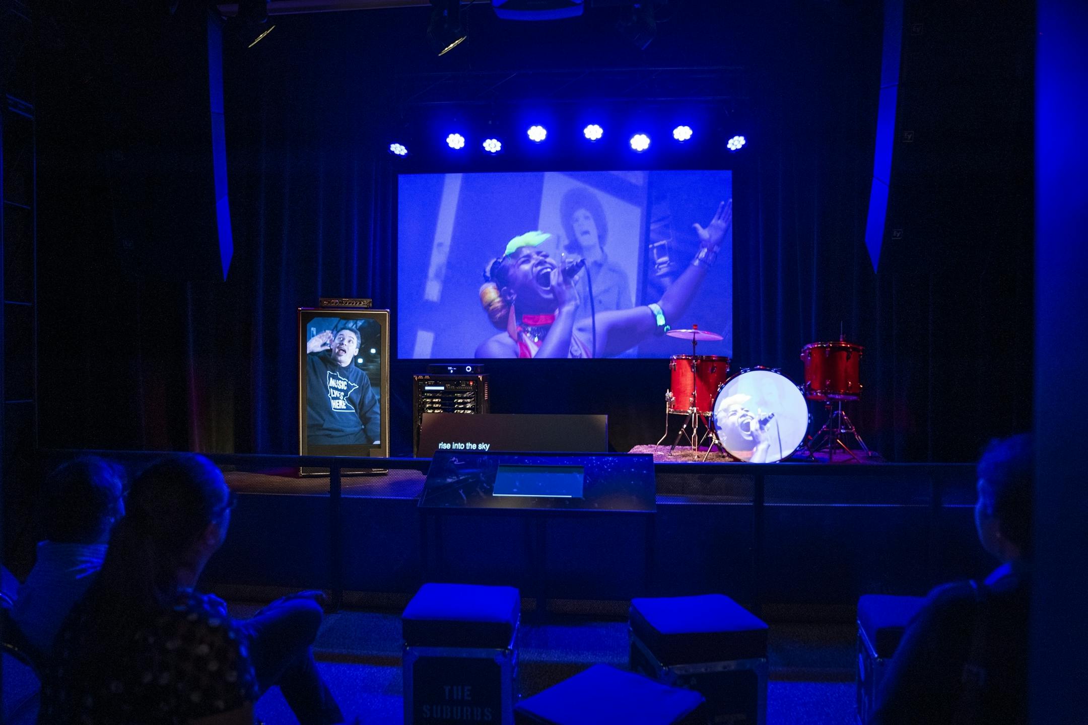 Minnesota History Center employees watch a short documentary.