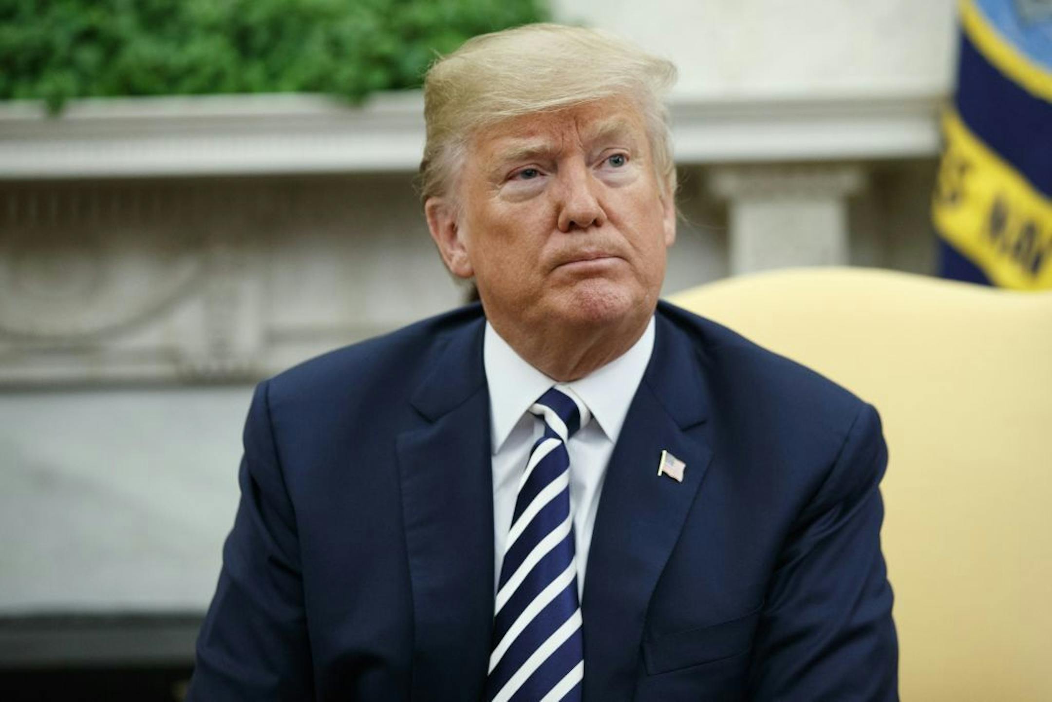 President Donald Trump pauses during a meeting with Saudi Crown Prince Mohammed bin Salman in the Oval Office of the White House, Tuesday, March 20, 2018, in Washington.