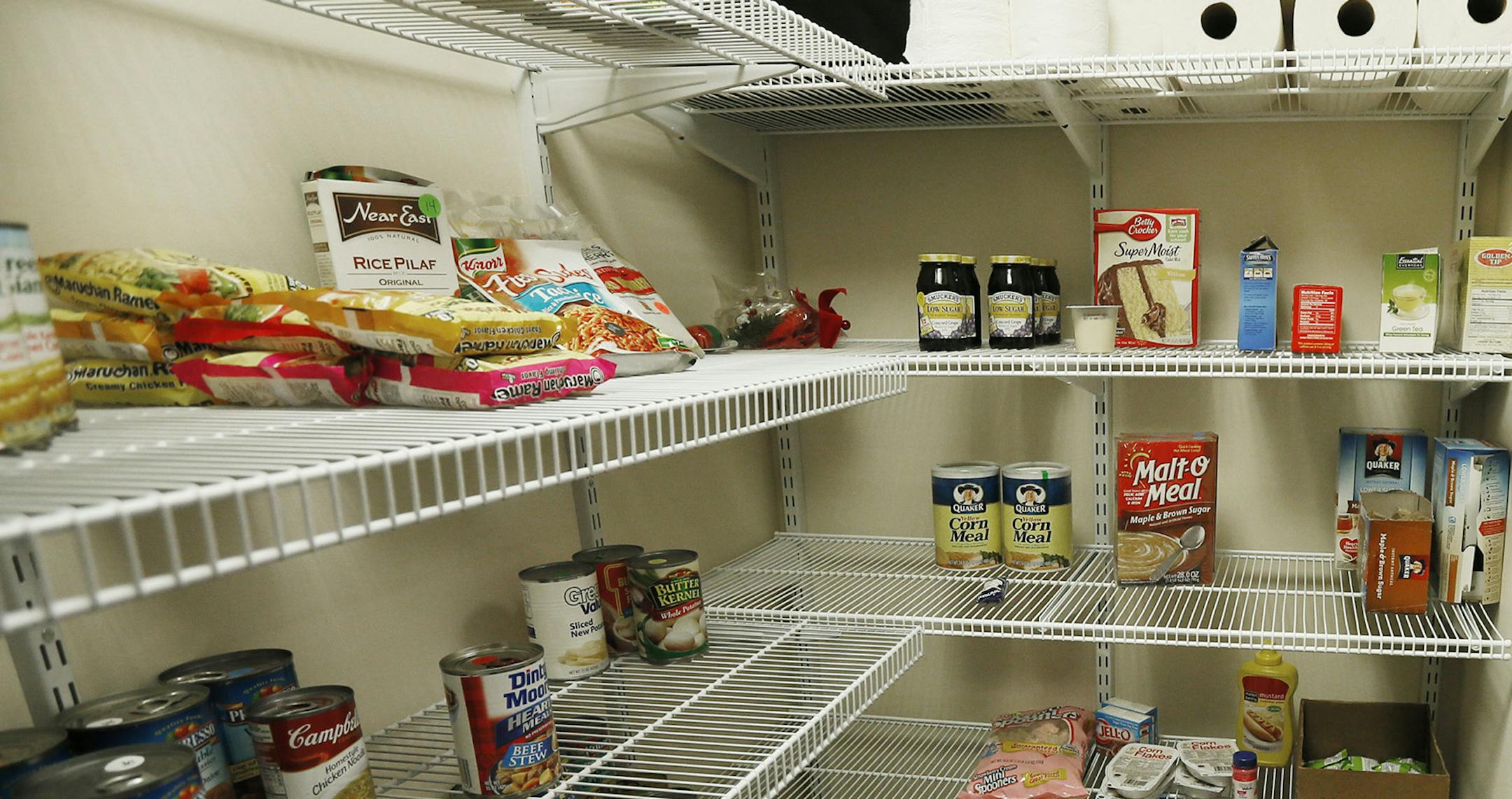 Laura Hafffield is the coordinator and, executive assistant to the vice chancellor for student life at the University of Minnesota Duluth talked about the food shelf that was setup on the campus for students who might need the services Thursday May 15, 2014 in Duluth , MN. ] Jerry Holt Jerry.holt@startribune.com ORG XMIT: MIN1405211402350442