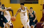 Gopher Amir Coffey drove down the court during an exhibition game vs. UW-Green Bay, for hurricane relief for Puerto Rico at the Sports Pavilion Saturd
