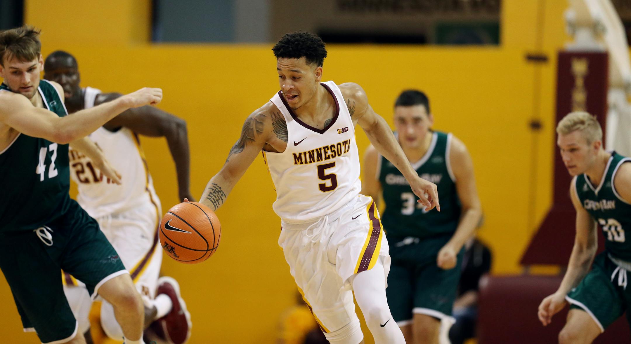 Gopher Amir Coffey drove down the court during an exhibition game vs. UW-Green Bay, for hurricane relief for Puerto Rico at the Sports Pavilion Saturday November 5,2017 in Minneapolis, MN. Minnesota beat UW -Green Bay 115-86.] JERRY HOLT ï jerry.holt@startribune.com
