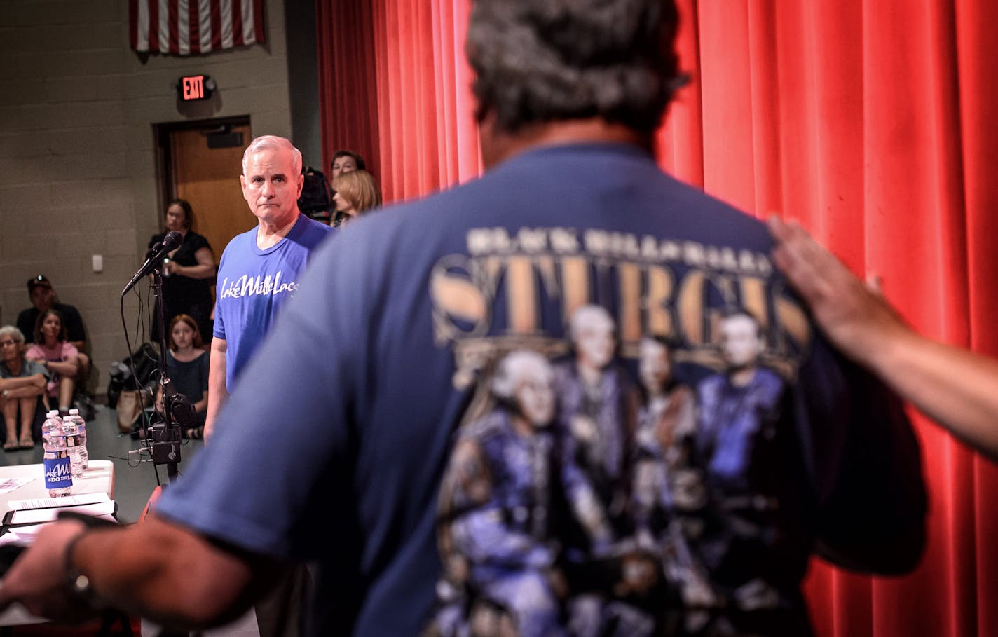 Jack Dunn was warned about speaking too long as residents spoke to Governor Dayton about how the walleye crisis is effecting their lives and businesses. ] GLEN STUBBE * gstubbe@startribune.com Friday, July 31, 2015 In a town hall meeting in Isle, MN to discuss the walleye crisis on Lake Mille Lacs, Governor Dayton announced that Melanie Benjamin, chief executive of the Mille Lacs Band of Ojibwe, agreed her tribe would halt the netting of walleye next year.