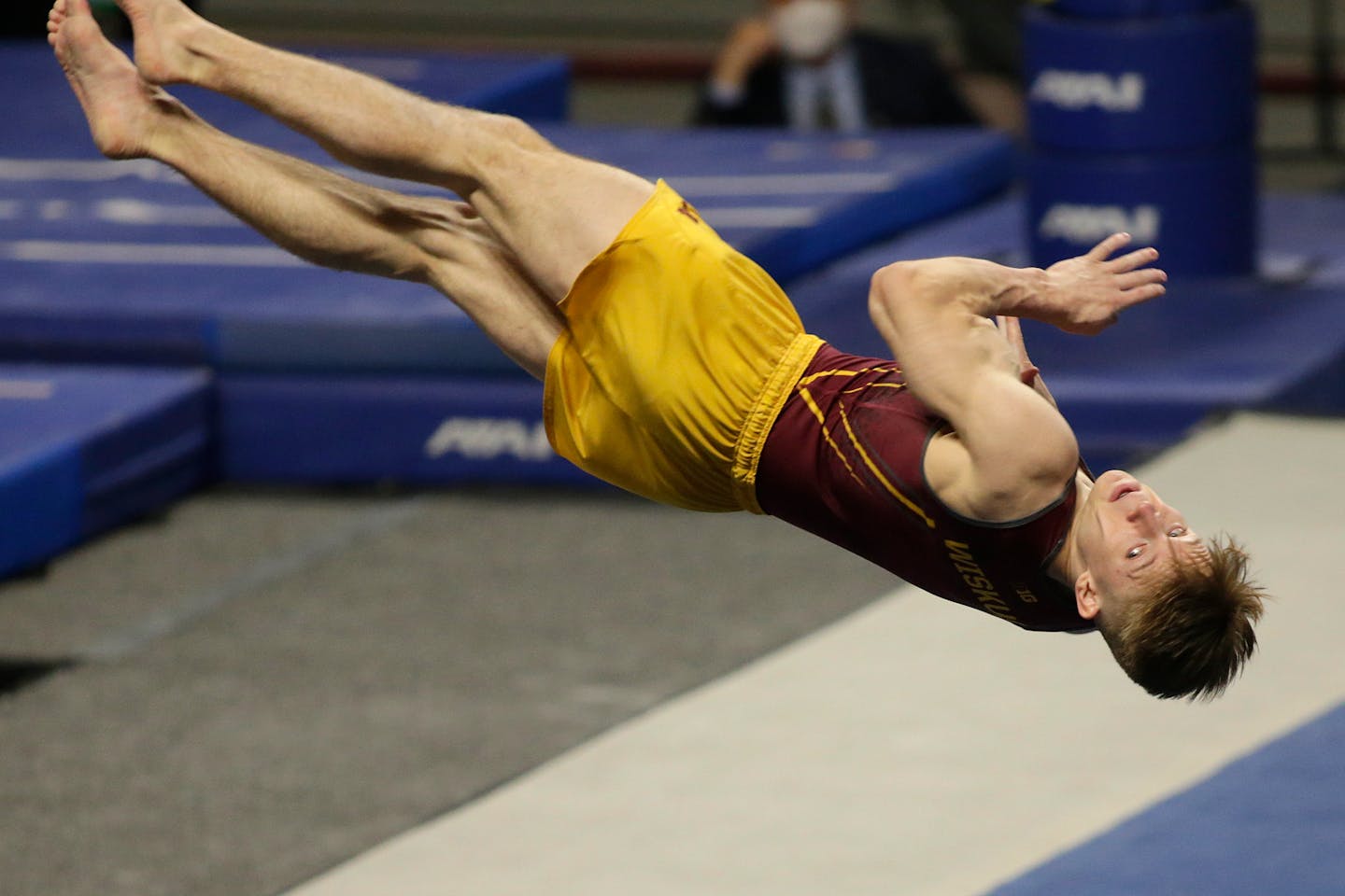 Minnesota's Shane Wiskus competes in the floor exercise during the NCAA men's gymnastics championships Friday