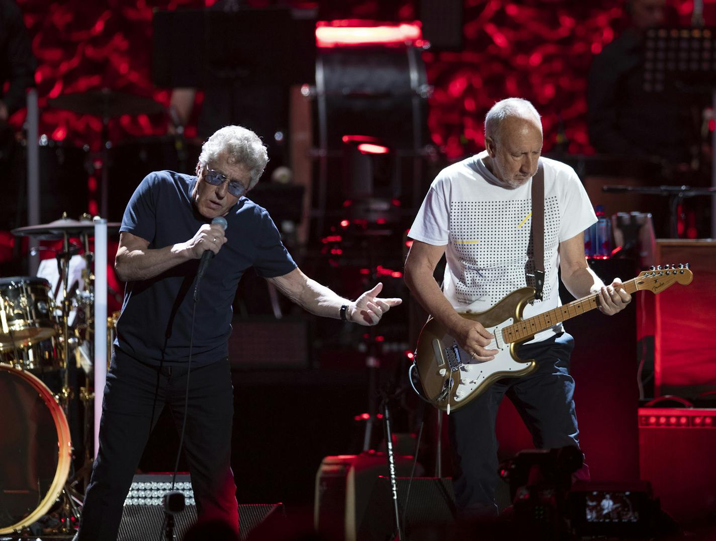 Lead singer Roger Daltrey with guitarist Pete Townshend during Amazing Journey early in The Who's show at Xcel Friday night. ] JEFF WHEELER &#x2022; jeff.wheeler@startribune.com The Who were joined by an orchestra for their Moving On! tour stop at Xcel Energy Center in St. Paul Friday night, September 6, 2019.