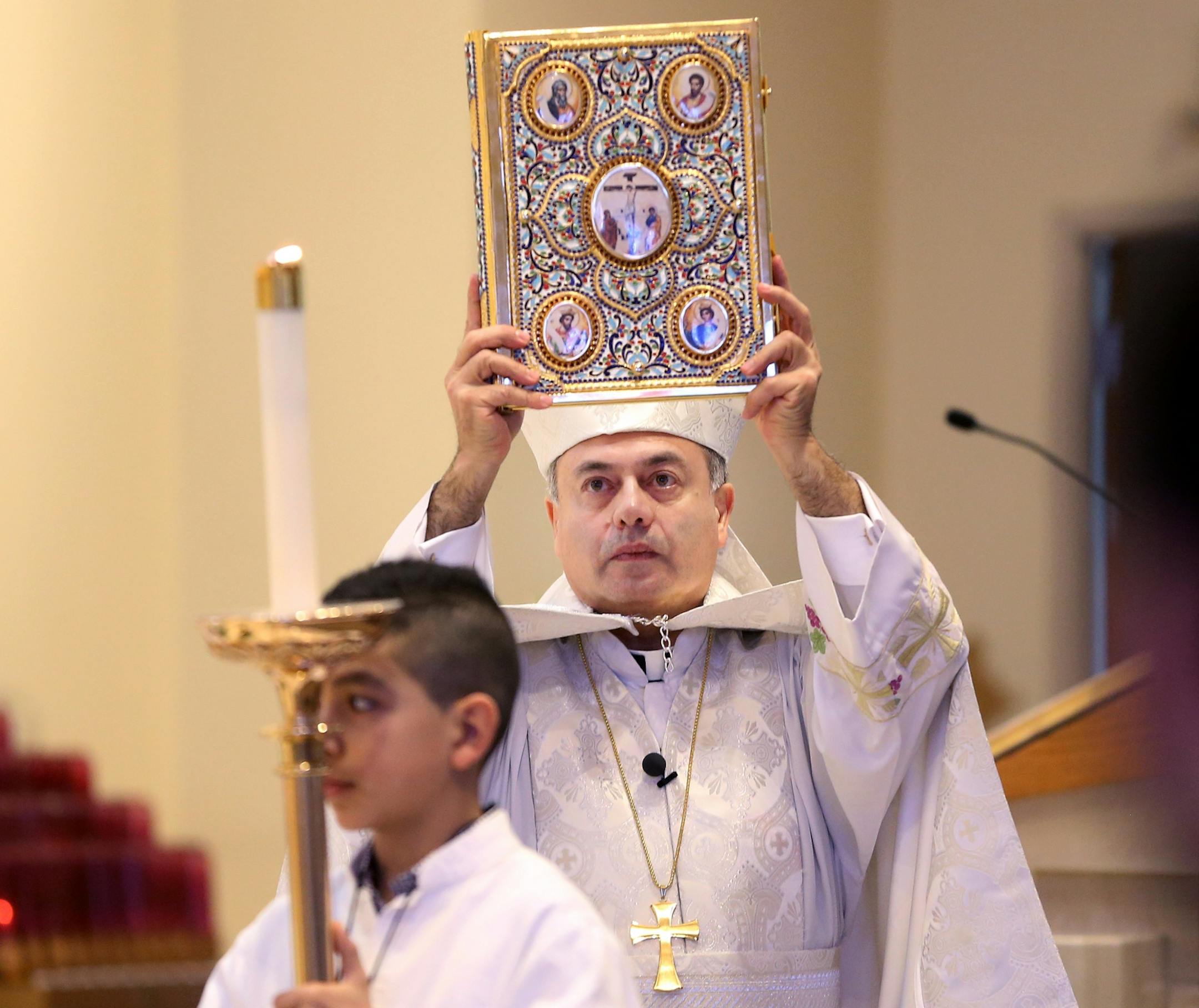 Pastor Sharbel-Ghattas Maroun led Palm Sunday services at Maron's Catholic Church March 20, 2016 in Minneapolis, MN.
