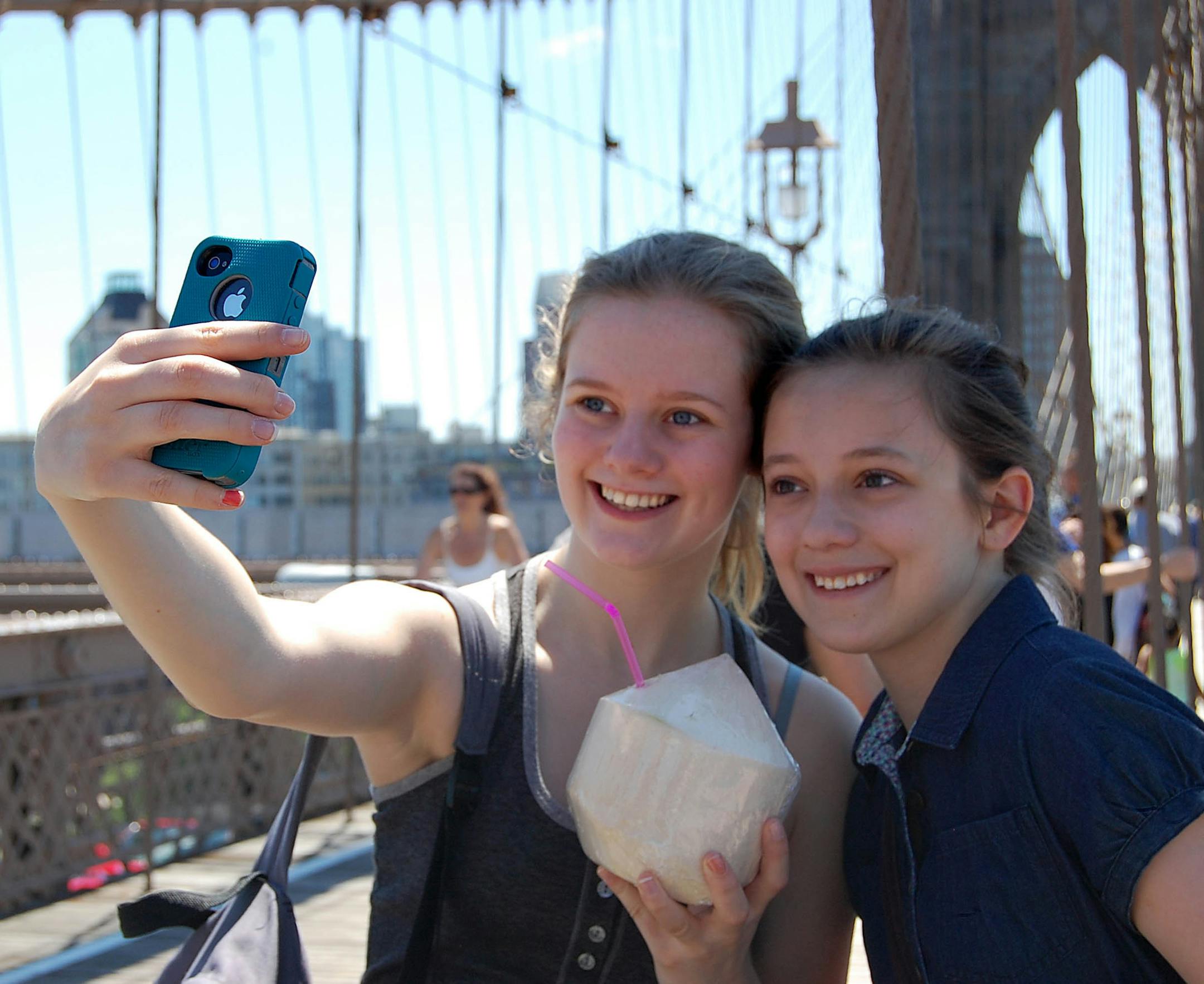 When traveling with teens, there must be selfies. Here, Anya (left) and Talia Magnuson of Minneapolis stop for a quick snapshot on while walking the Brooklyn Bridge from Brooklyn to Manhattan in July 2014.