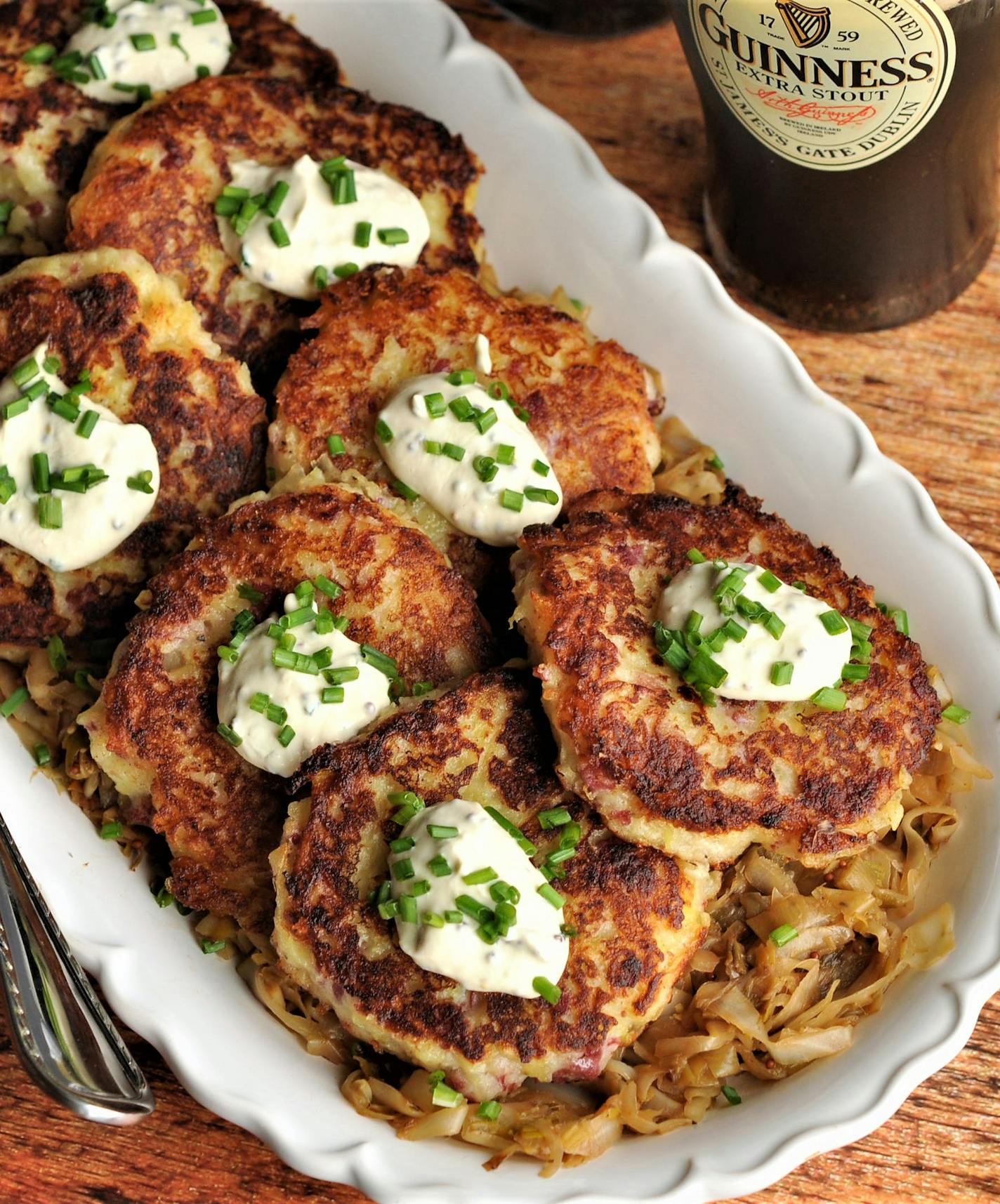 Corned Beef, Cheddar and Potato Boxty with Sautéed Cabbage and Creamy Mustard Sauce.