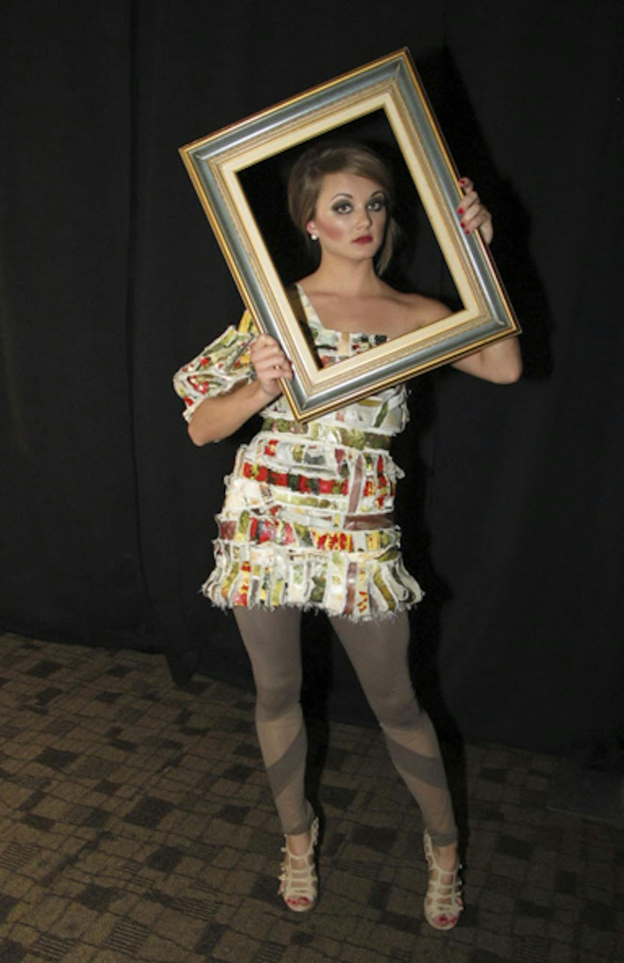 Alison Holmes of Artful Décor, in a dress made from canvases in collaboration with artist Patric Kemal Pryor.