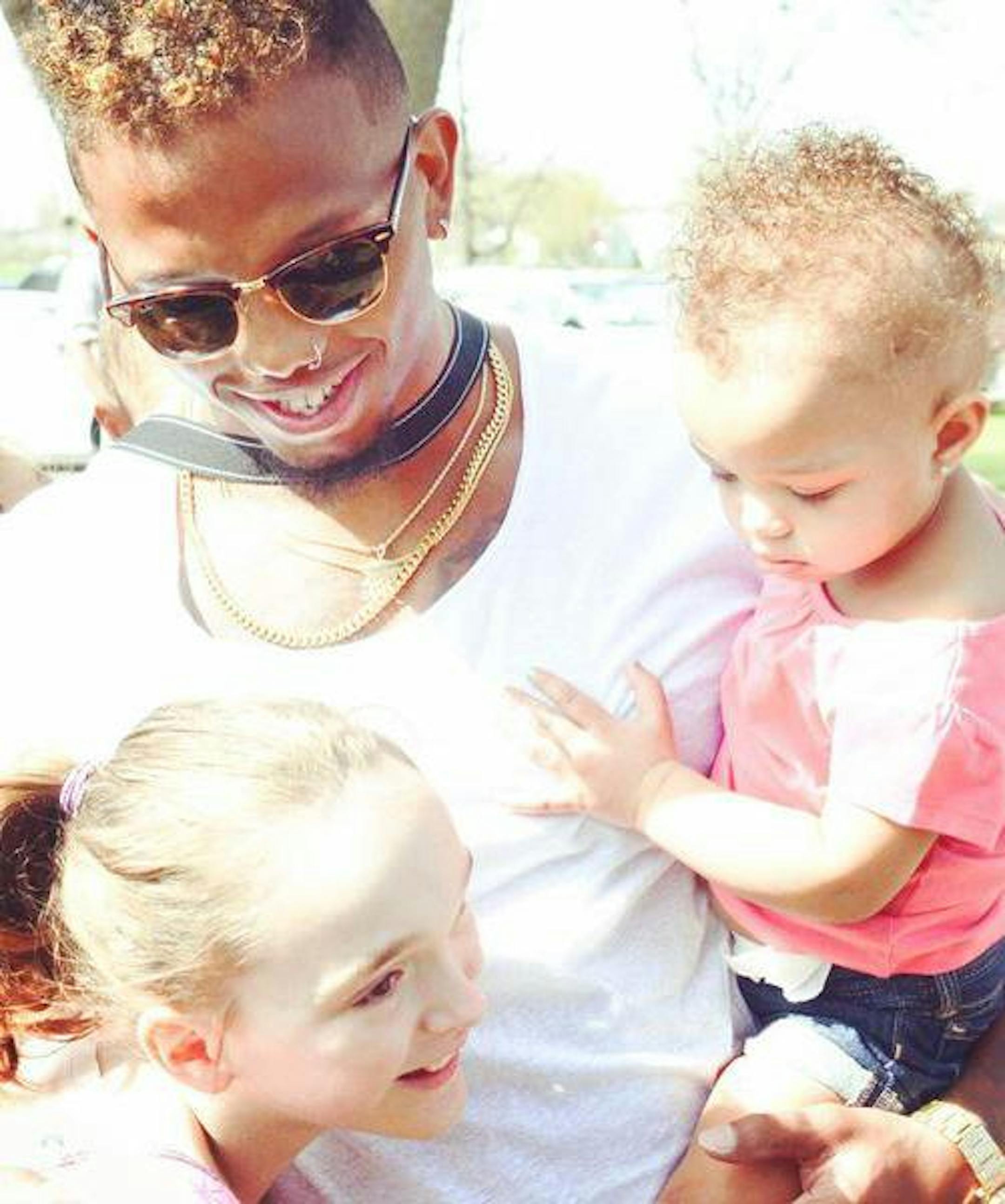 Vikings WR Charles Johnson, 1-year-old daughter Hayzel and 10-year-old birth celebrant Mackenzie Moretter Photo courtesy of Charles Johnson