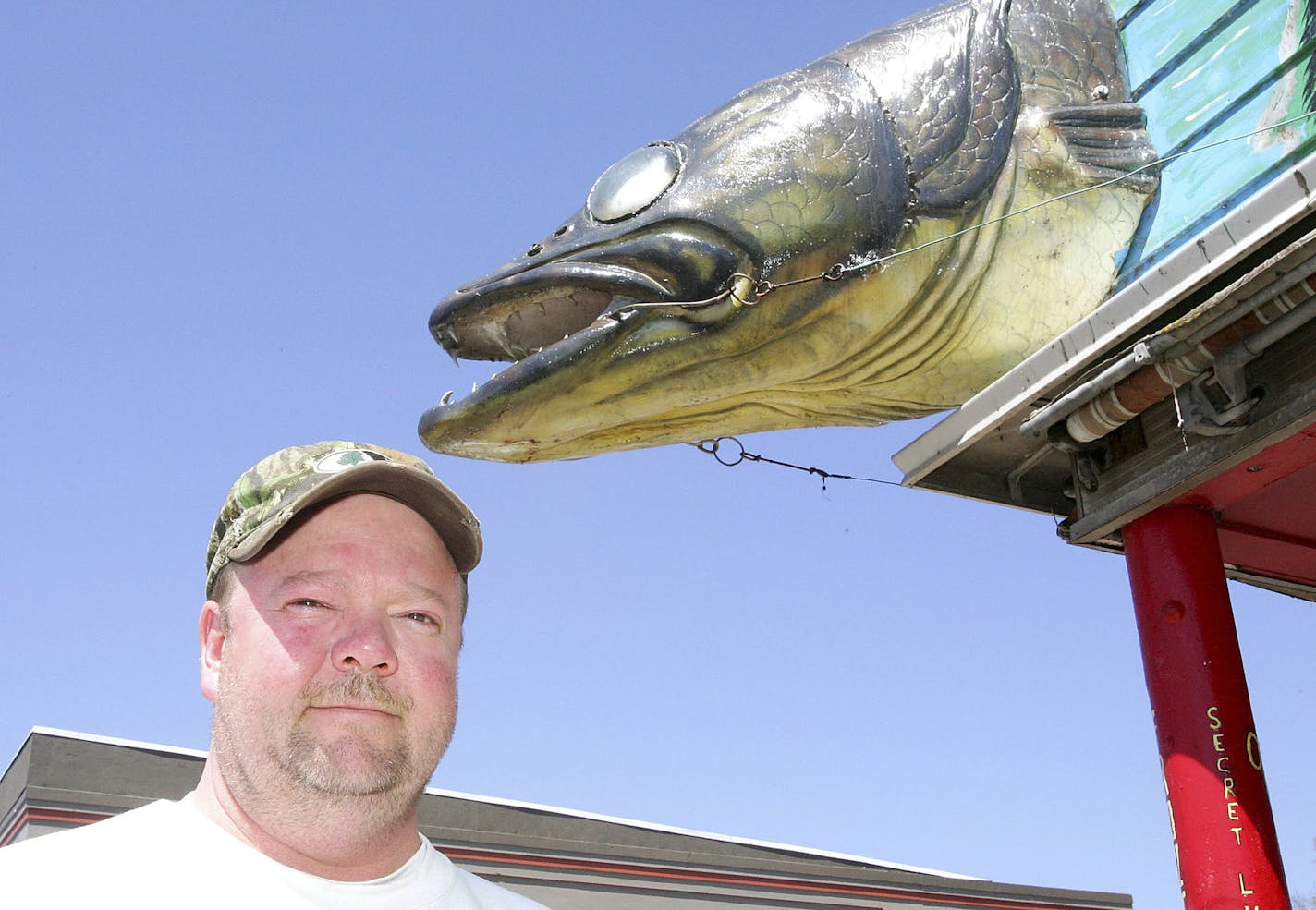 Tyson Cronberg outside the Beaver House bait shop.