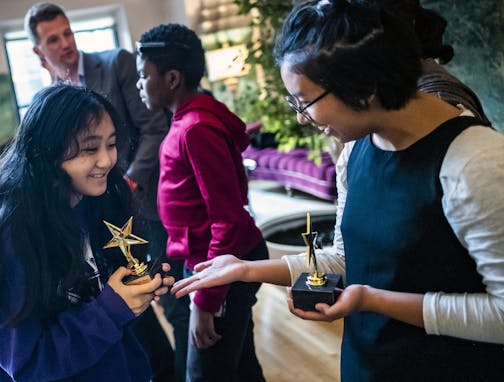 L to R: Graphic designers Mary Yang and Kenneth Curry, along with Coreti Soe, researcher, with another team member not pictured won for best pitch of the night. ] 2019 Silicon North Stars Minnesota Demo Day features 24 students who pitch their ideas on how to solve a pressing social problem affecting their lives by using innovative technology. RICHARD TSONG-TAATARII &#xa5; richard.tsong-taatarii@startribune.com