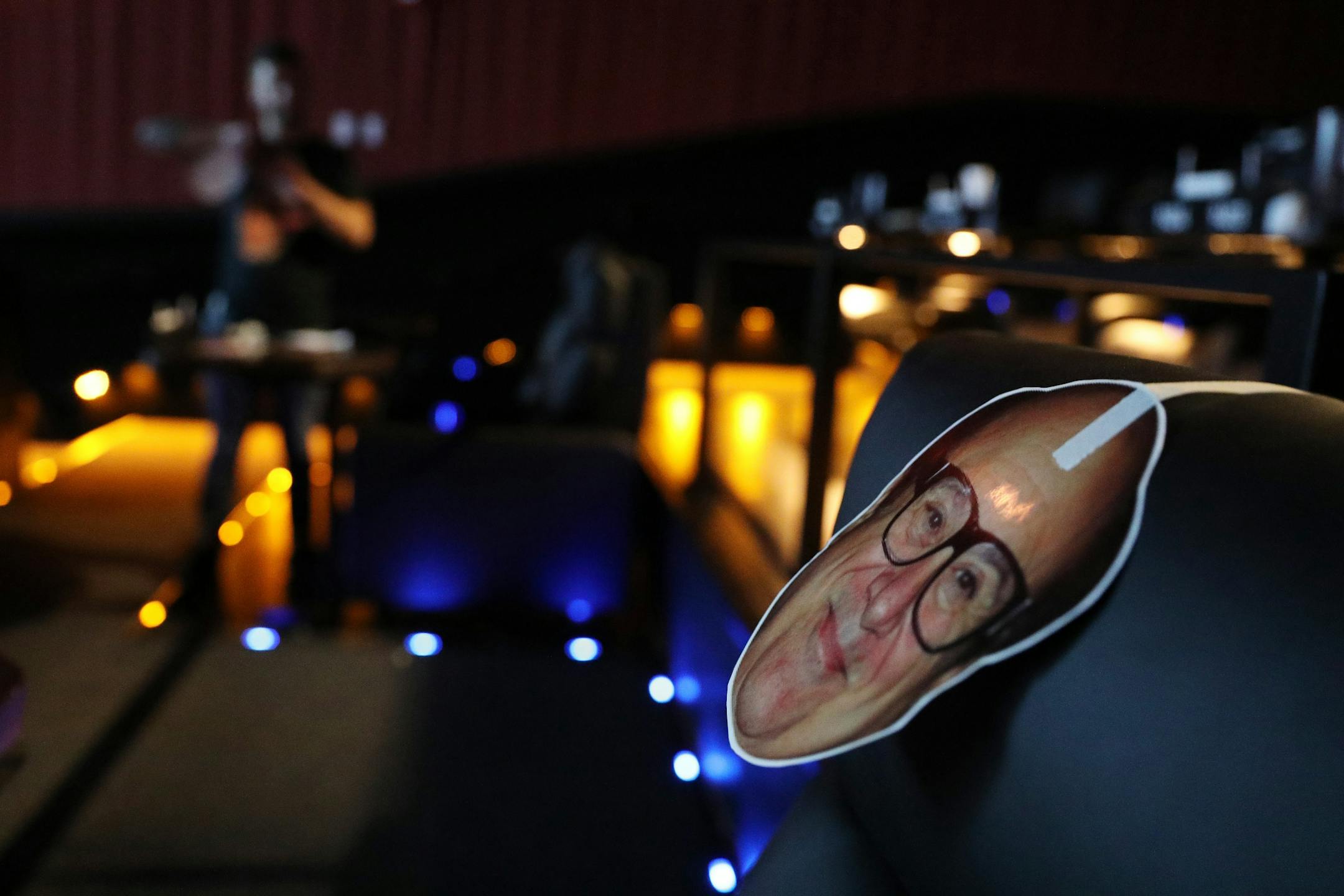 Celebrity faces including Danny DeVito helped staff know which seats were occupied during a training session at Alamo Drafthouse Cinema.