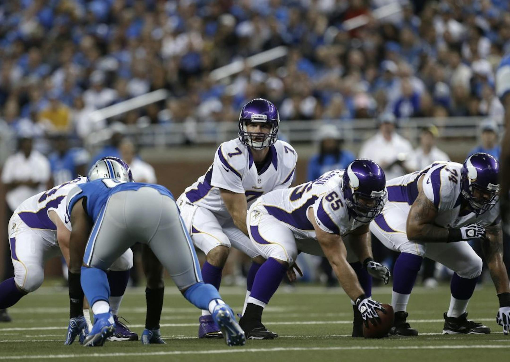 Christian Ponder lines up against the Detroit Lions.