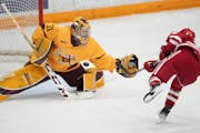 Gophers goalie Skylar Vetter squared off with Wisconsin's Lacey Eden when the teams met on Dec. 9 at Ridder Arena. They'll meet again on Friday.