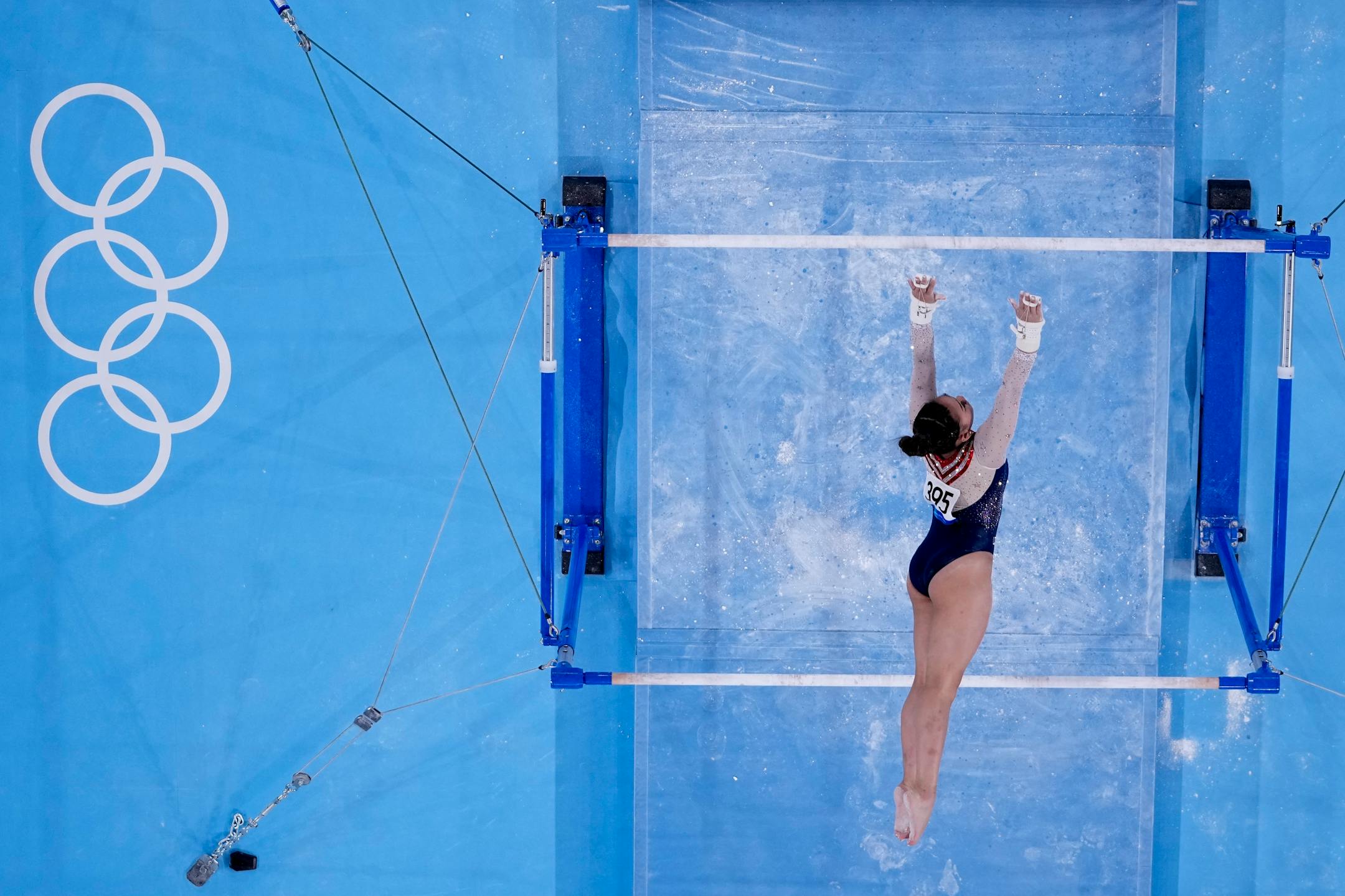 Suni Lee, of the United States, performs on the uneven bars during the artistic gymnastics women's all-around final at the 2020 Summer Olympics, Thursday, July 29, 2021, in Tokyo. (AP Photo/Morry Gash)