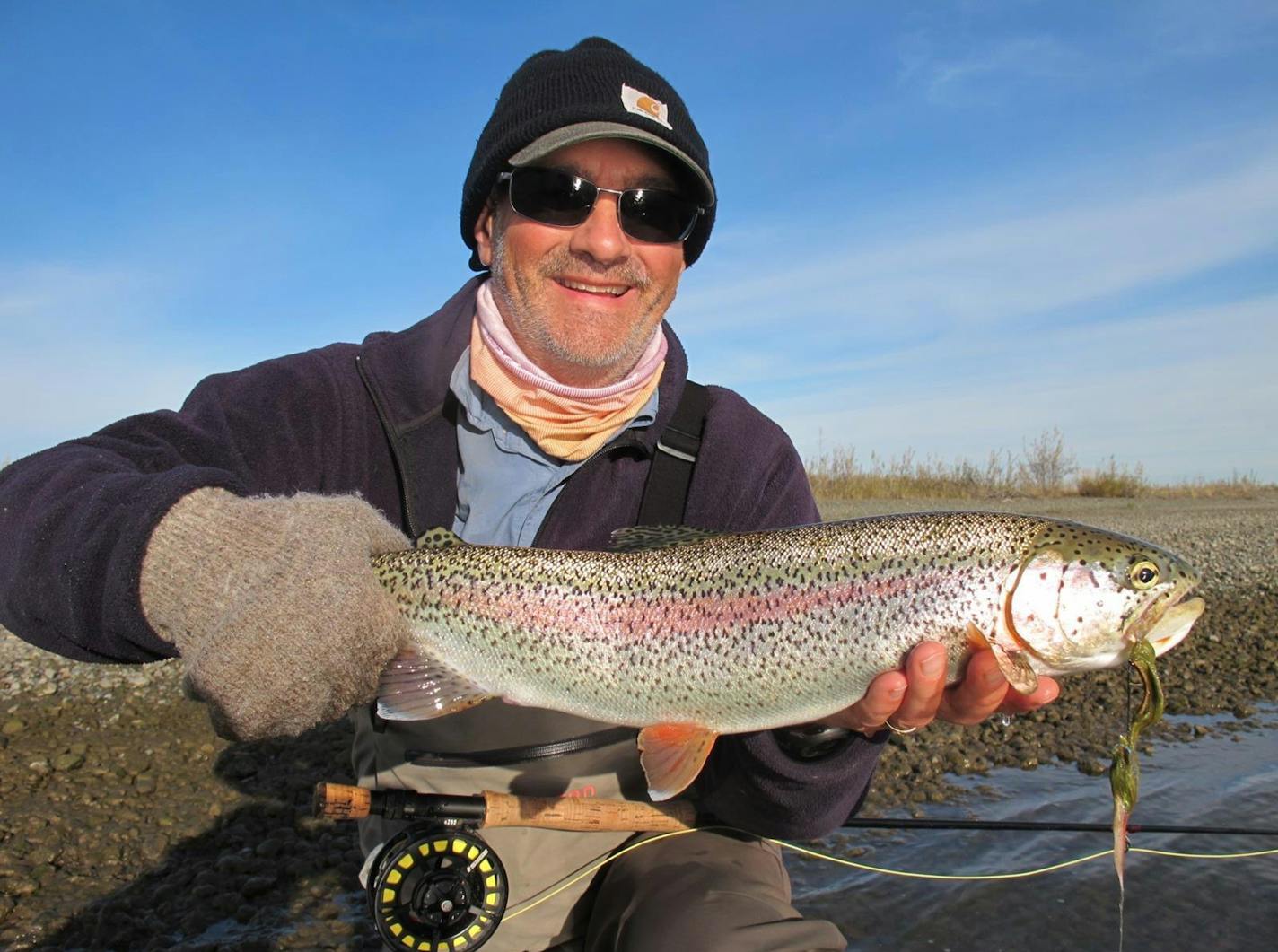 Chris Niskanen with a rainbow trout caught in Alaska. Niskanen, previously the St. Paul Pioneer Press outdoors columnist, has been the DNR communications director for about 10 years. He's leaving the agency in about a week.