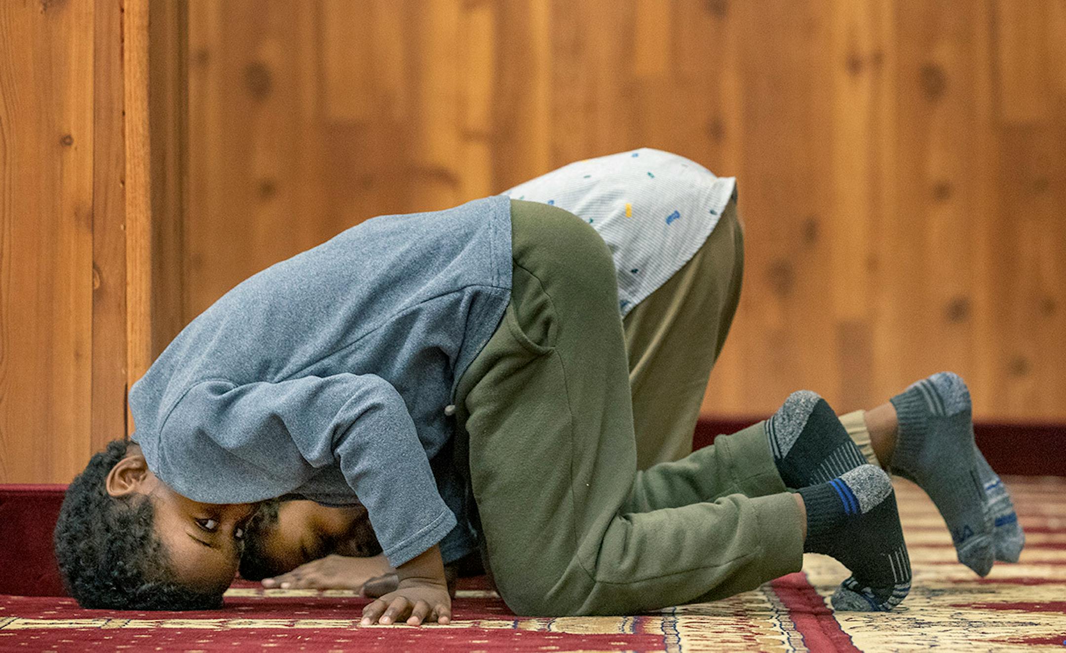 Khalid Nuur, 5, prayed at the Tawfiq Islamic Center in Minneapolis during Ramadan on Monday, May 6, 2019.