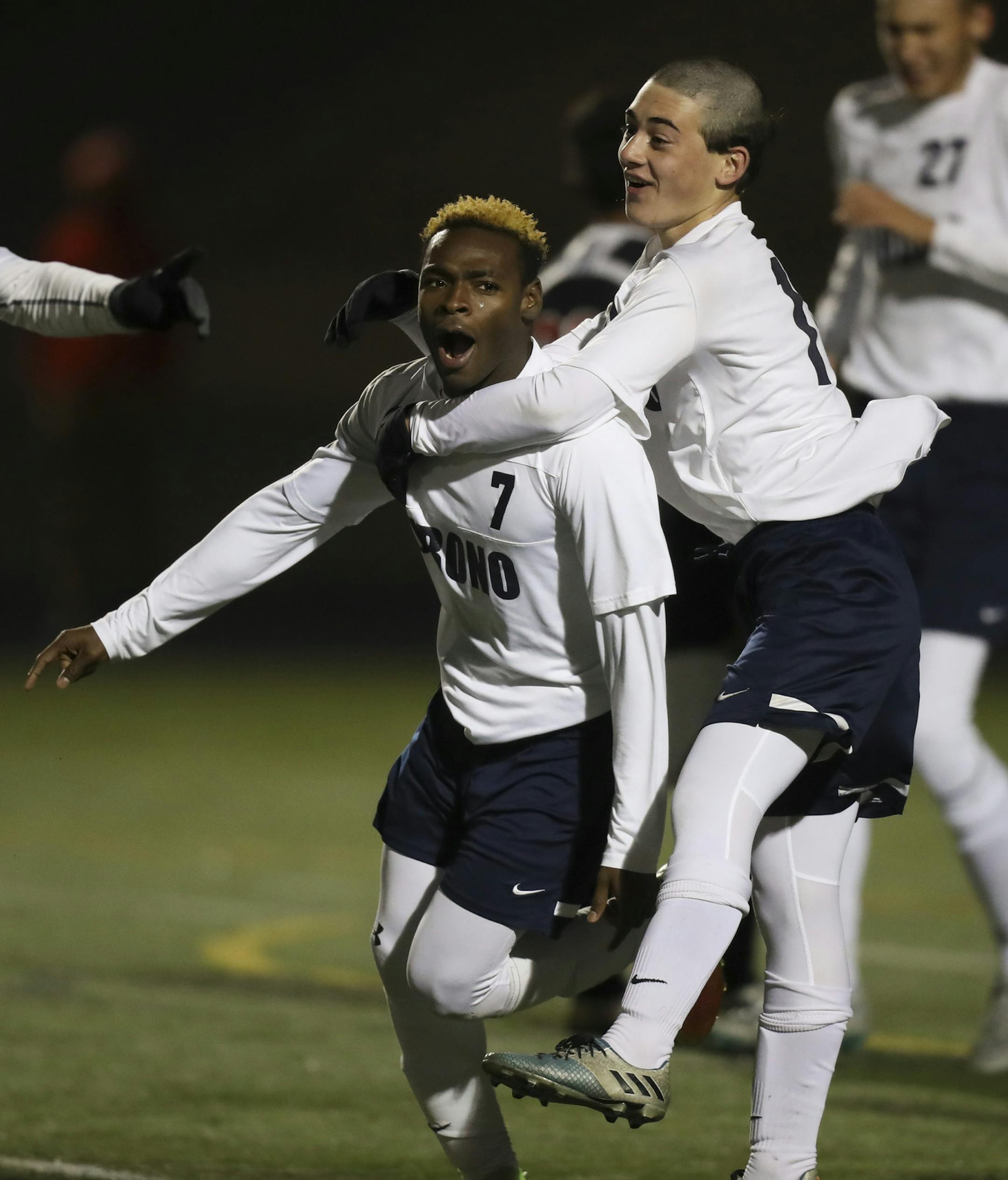 Orono's Guyvenson Mohs (7) celebrated his goal in overtime with Jamie Bazil and Christian Babo (10) Tuesday night. ] JEFF WHEELER ï jeff.wheeler@startribune.com Orono beat Worthington 3-2 in overtime in their boy's Class 1A Soccer State Tournament quarterfinal game Tuesday night, October 24, 2017 at Farmington High School.