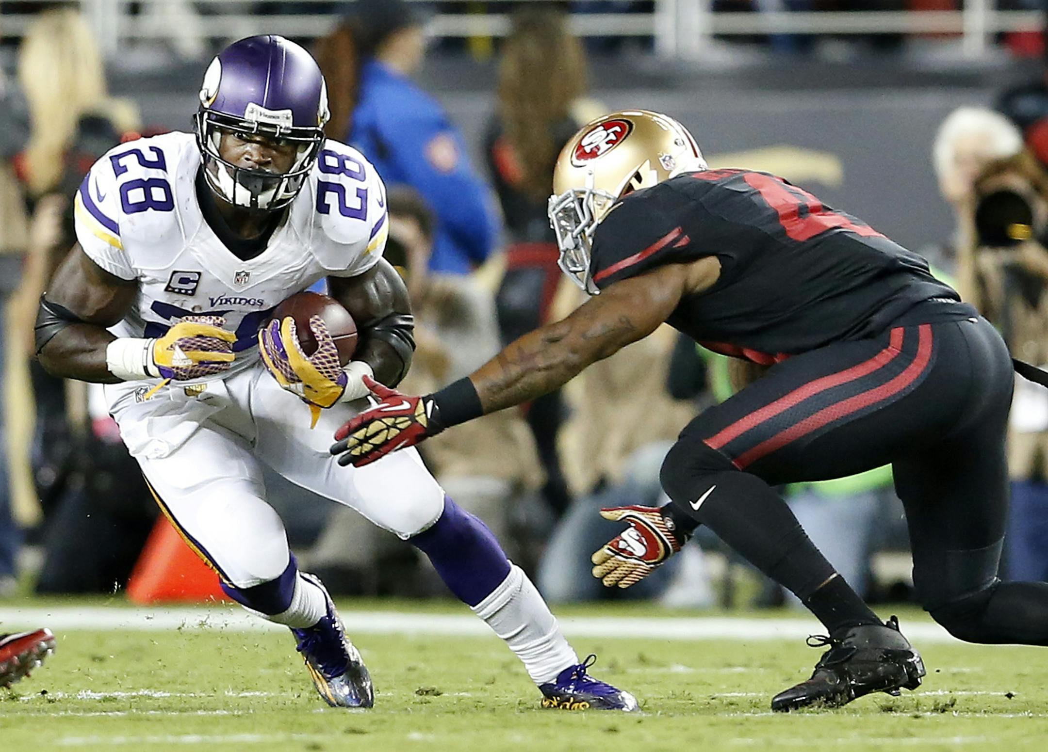 Vikings running back Adrian Peterson, in his first regular-season game after missing most of last year because of legal issues, cut upfield during a run against the 49ers in the second quarter.