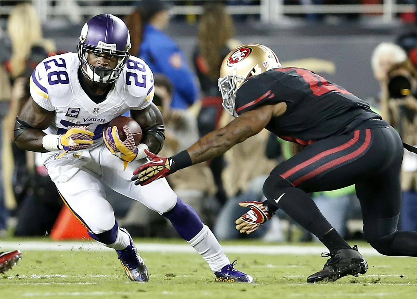 Vikings running back Adrian Peterson, in his first regular-season game after missing most of last year because of legal issues, cut upfield during a run against the 49ers in the second quarter.