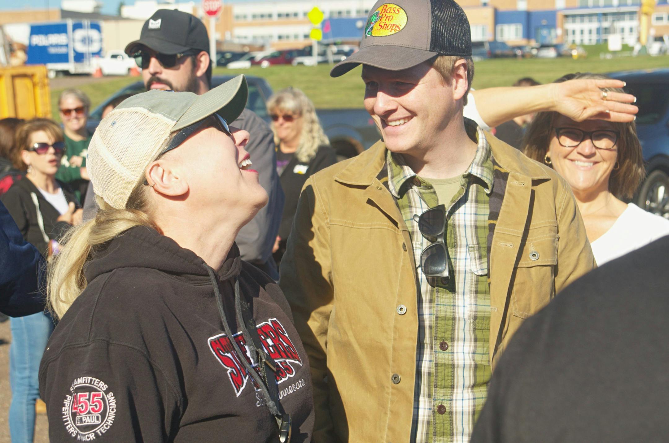 Sen. Judy Seeberger, left, laughs as she speaks with Sen. Grant Hauschild.