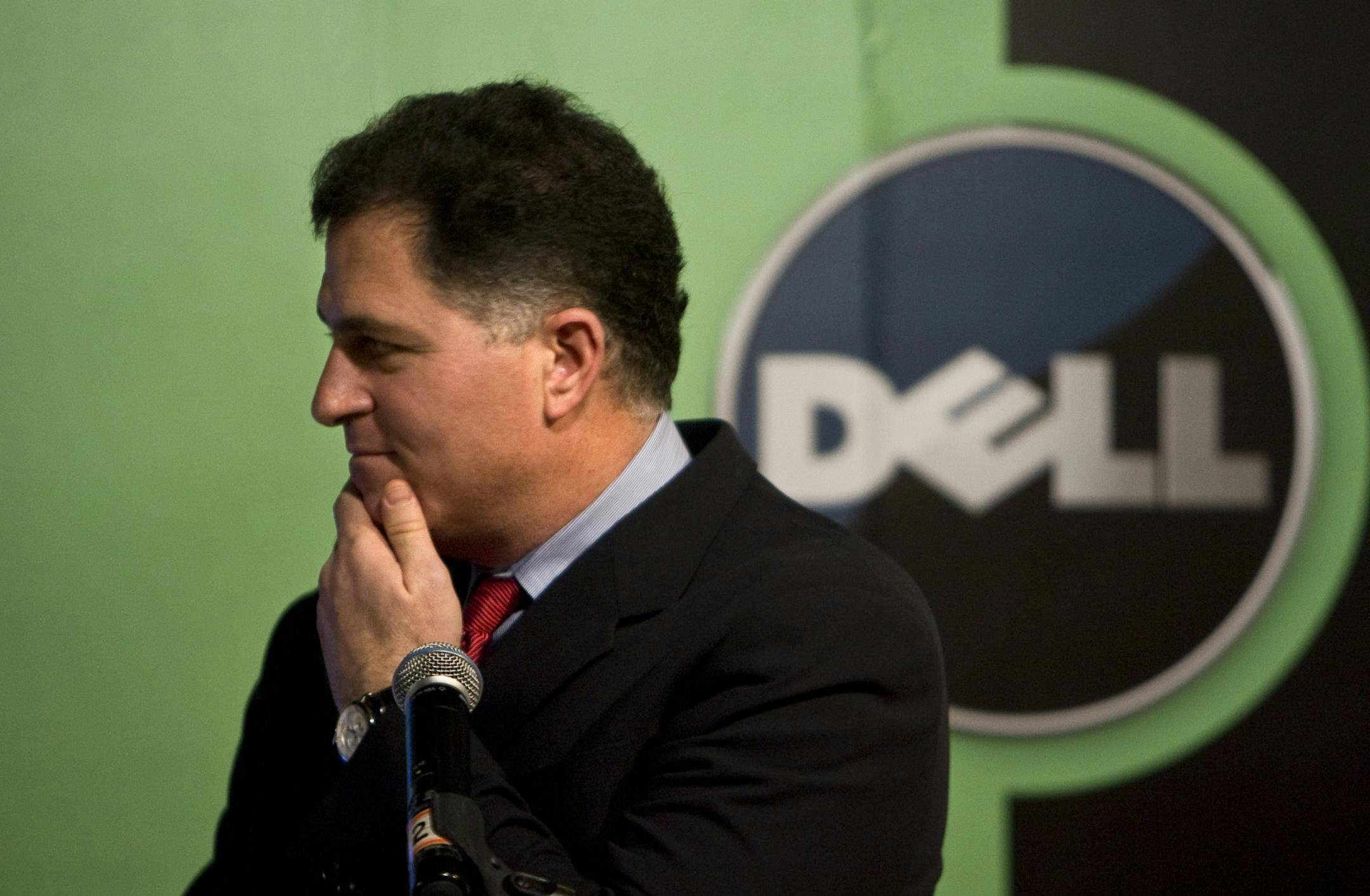 FILE - In this Thursday, March 26, 2009 file photo, Michael Dell, Chairman and CEO of Dell Inc., reacts to a question during a news conference in Beijing. Dellís board rejected CEO Michael Dellís attempt to change the voting rules for his bid to buy the slumping personal computer maker, a decision that is likely to doom the deal on Wednesday, July 31, 2013. (AP Photo/Alexander F. Yuan, File)